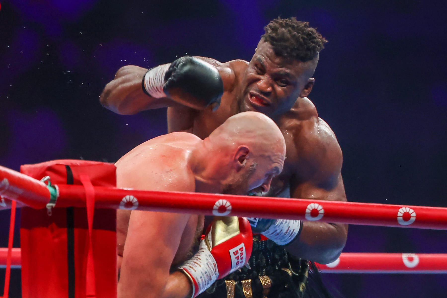 Britain's Tyson Fury (L) fights against Cameroonian-French Francis Ngannou during their heavyweight boxing match in Riyadh early on October 29, 2023. (Photo by Fayez NURELDINE / AFP) (Photo by FAYEZ NURELDINE/AFP via Getty Images)