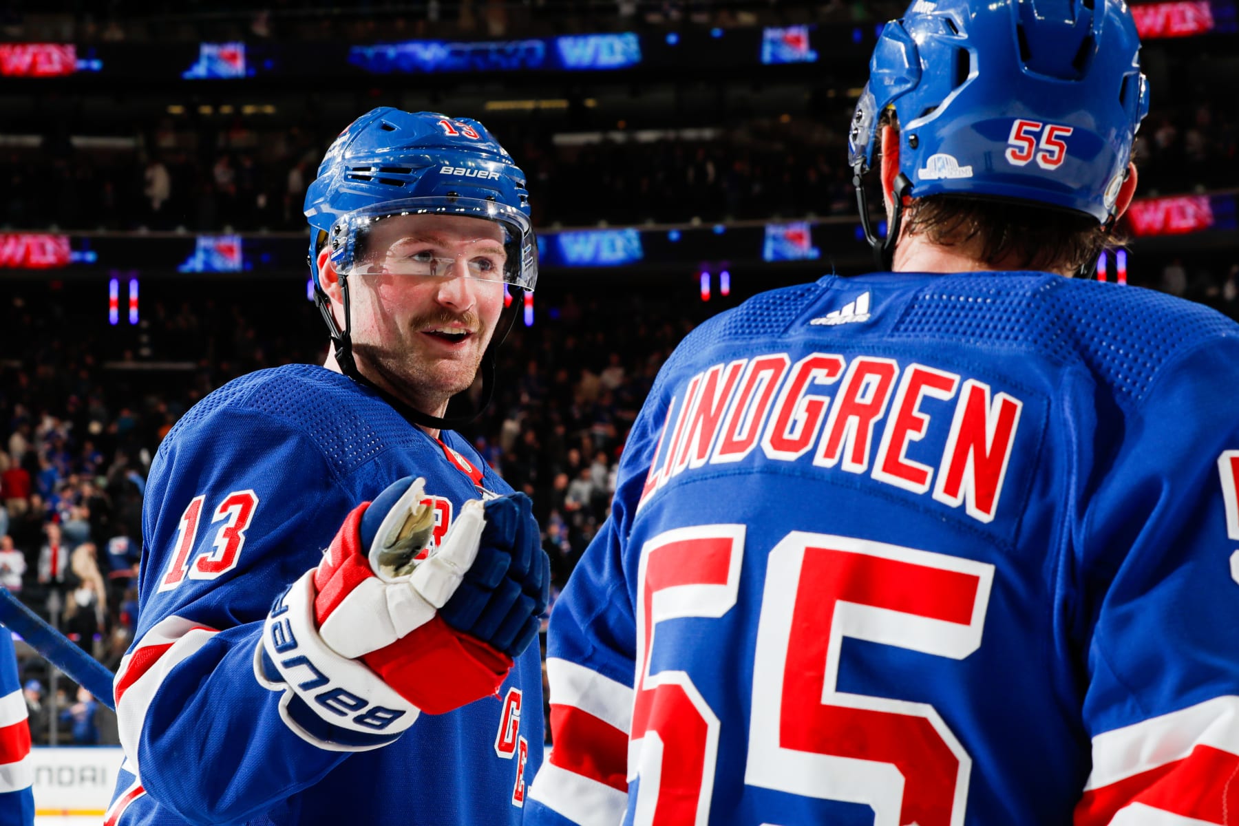 NEW YORK, NEW YORK - NOVEMBER 02: Alexis Lafreniere #13 and Ryan Lindgren #55 of the New York Rangers celebrate a 2-1 win against the Carolina Hurricanes at Madison Square Garden on November 2, 2023 in New York City. (Photo by Jared Silber/NHLI via Getty Images)