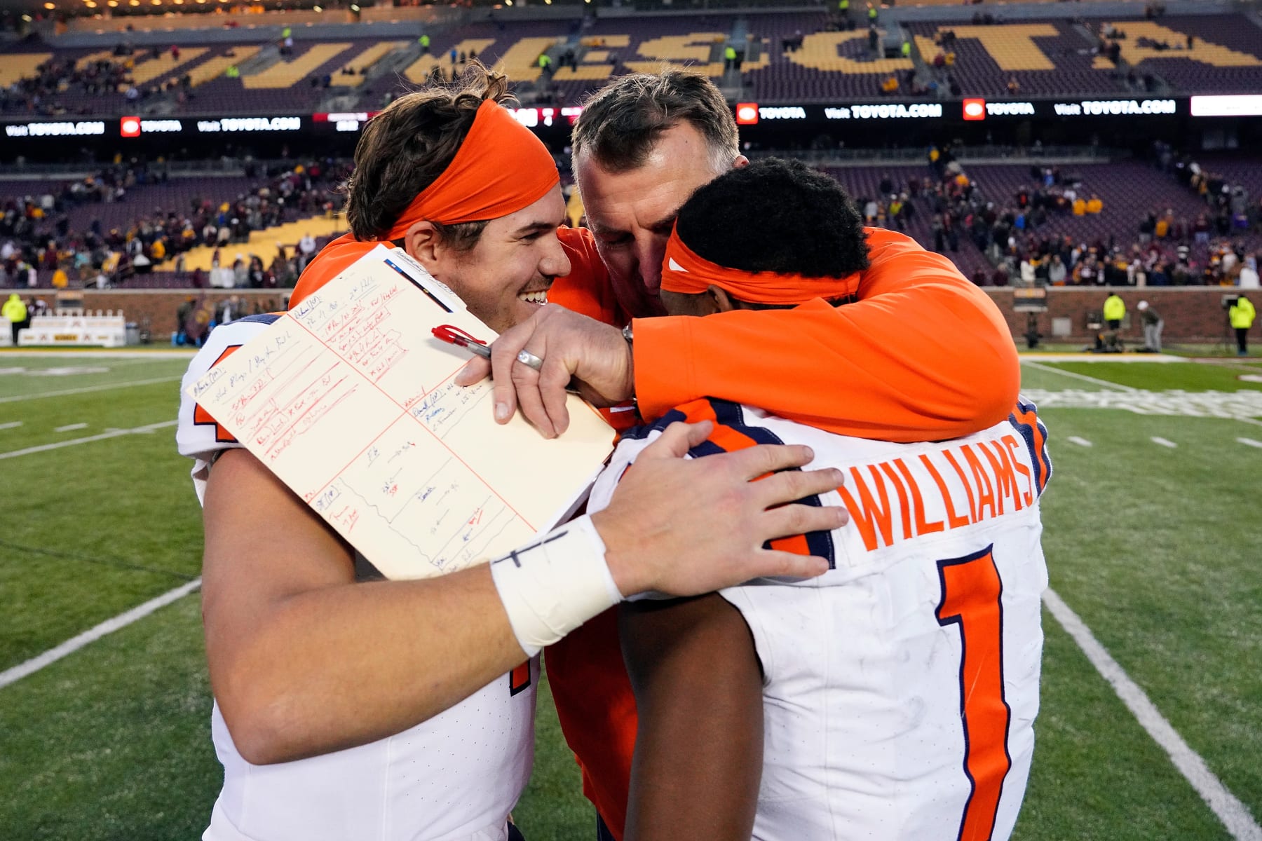 MINNEAPOLIS, MINNESOTA - NOVEMBER 04: Head coach Bret Bielema of the Illinois Fighting Illini celebrates with John Paddock #4 (L) and Isaiah Williams #1 after the game against the Minnesota Golden Gophers at Huntington Bank Stadium on November 04, 2023 in Minneapolis, Minnesota. The Fighting Illini defeated the Golden Gophers 27-26. (Photo by David Berding/Getty Images)