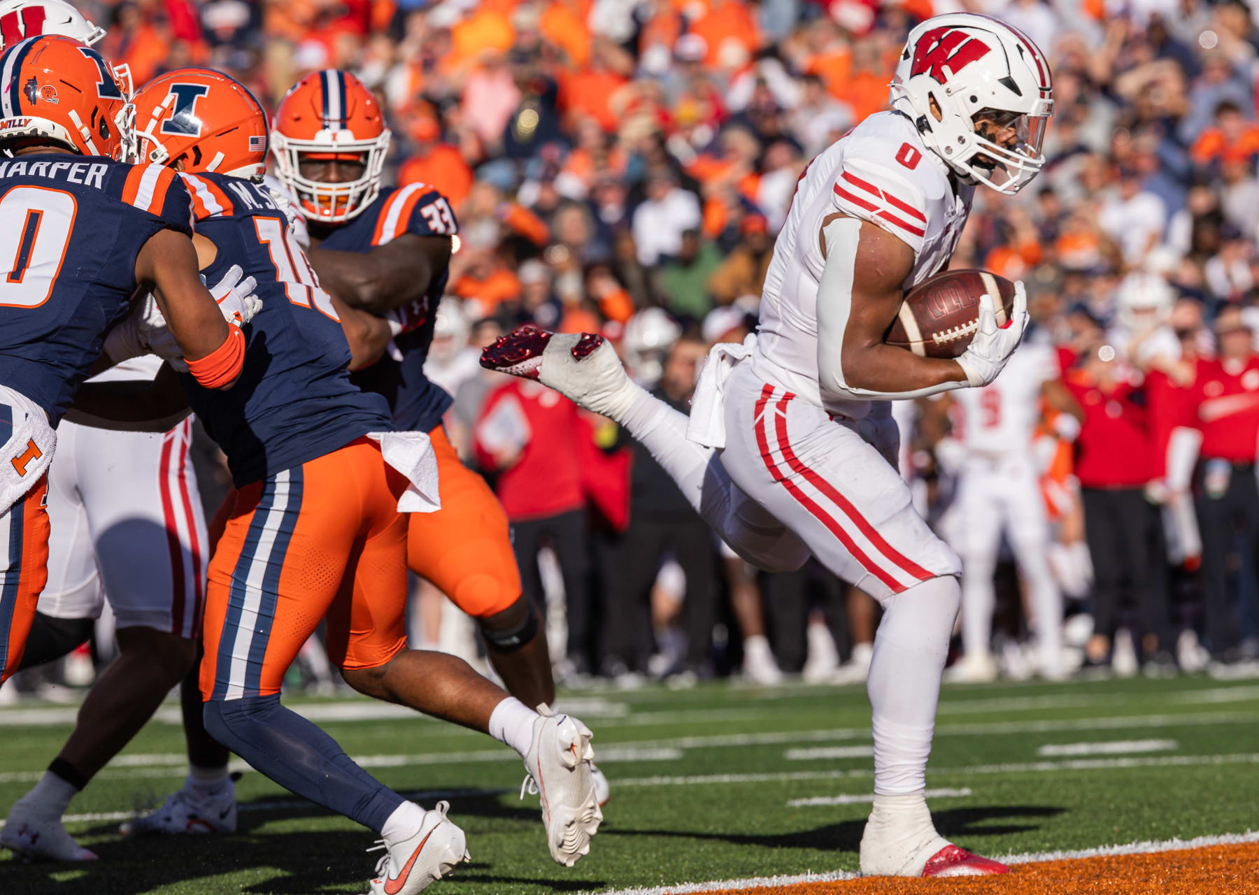 CHAMPAIGN, ILLINOIS - OCTOBER 21: Braelon Allen #0 of the Wisconsin Badgers runs for a touchdown during the game against the Illinois Fighting Illini at Memorial Stadium on October 21, 2023 in Champaign, Illinois. (Photo by Michael Hickey/Getty Images)