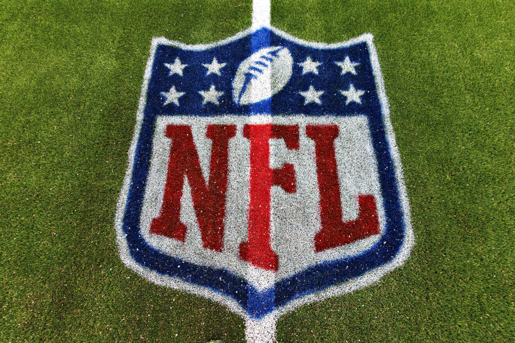 NASHVILLE, TENNESSEE - OCTOBER 29: NFL logo on the field before the game between the Tennessee Titans and the Atlanta Falcons at Nissan Stadium on October 29, 2023 in Nashville, Tennessee. The Titans defeated the Falcons 28-23. (Photo by Wesley Hitt/Getty Images)