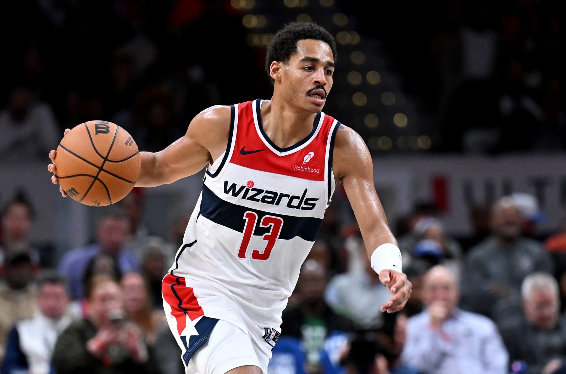 WASHINGTON, DC - OCTOBER 30: Jordan Poole #13 of the Washington Wizards handles the ball against the Boston Celtics at Capital One Arena on October 30, 2023 in Washington, DC.  NOTE TO USER: User expressly acknowledges and agrees that, by downloading and or using this photograph, User is consenting to the terms and conditions of the Getty Images License Agreement.  (Photo by G Fiume/Getty Images)