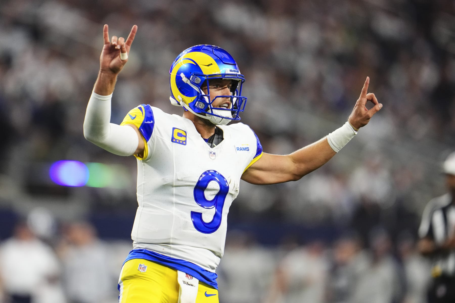 ARLINGTON, TX - OCTOBER 29: Matthew Stafford #9 of the Los Angeles Rams gives assignments during an NFL game against the Dallas Cowboys at AT&T Stadium on October 29, 2023 in Arlington, Texas. (Photo by Cooper Neill/Getty Images)