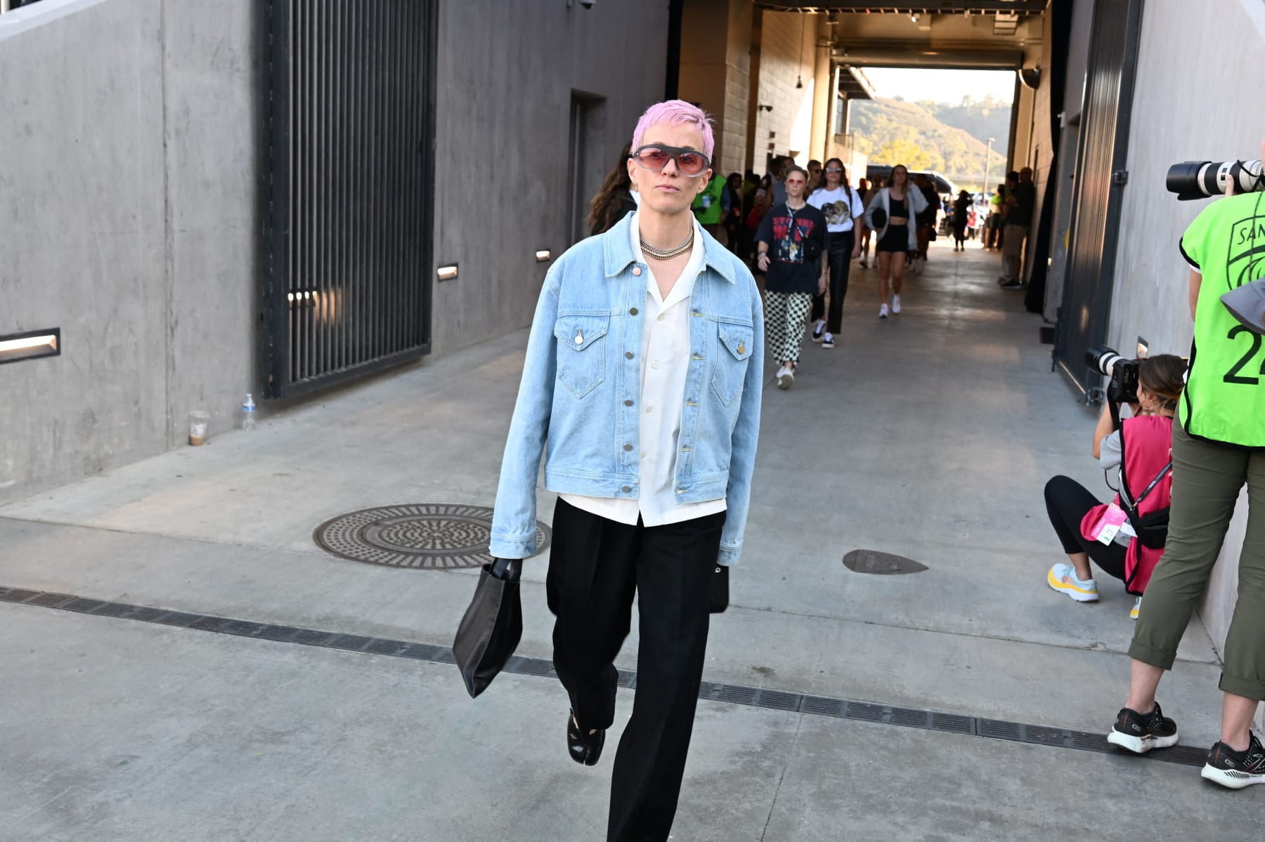 US soccer legend Megan Rapinoe of the OL Reign arrives for the National Women's Soccer League (NWSL) Championship final against Gotham FC on November 11, 2023 at Snapdragon Stadium in San Diego, California. This is Rapinoe's last professional game of her career as she retires from professional soccer. (Photo by Robyn Beck / AFP) (Photo by ROBYN BECK/AFP via Getty Images)