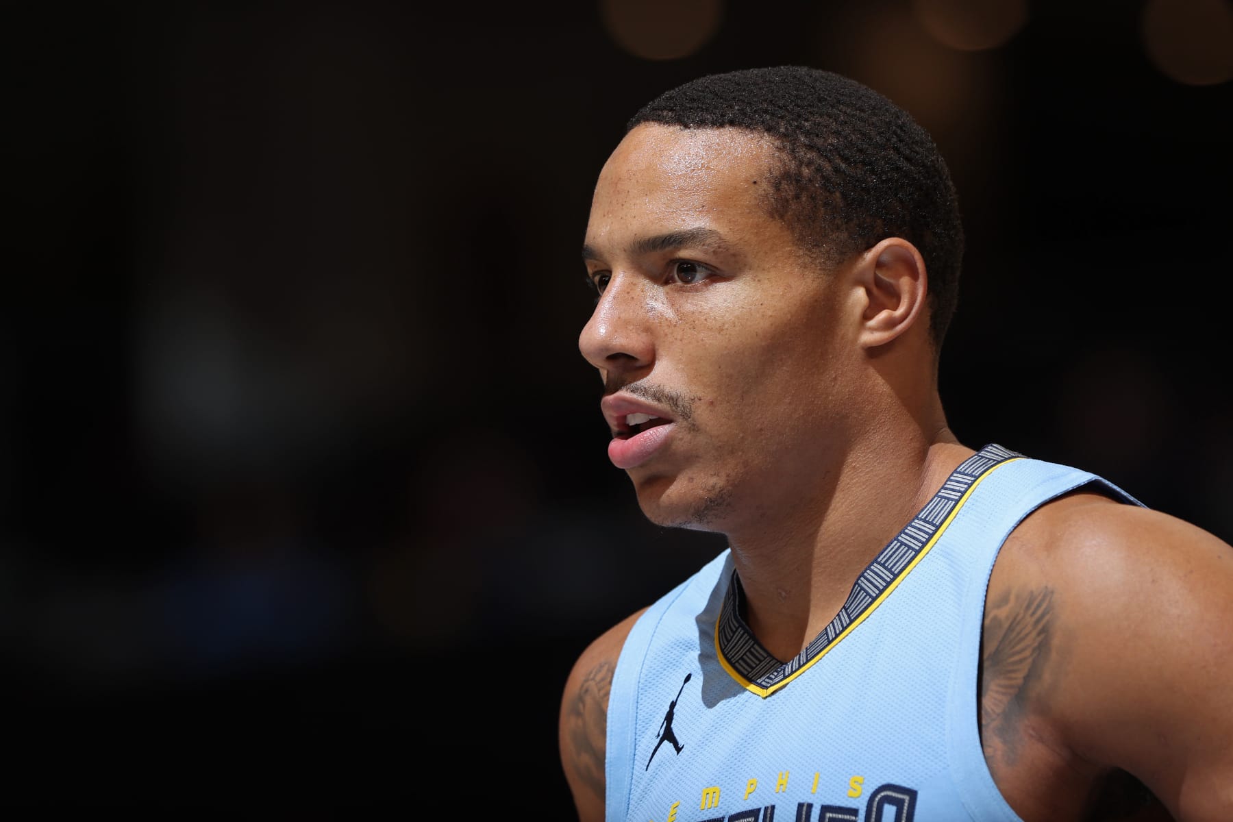 MEMPHIS, TN - NOVEMBER 8: Desmond Bane #22 of the Memphis Grizzlies looks on during the game against the Miami Heat on November 8, 2023 at FedExForum in Memphis, Tennessee. NOTE TO USER: User expressly acknowledges and agrees that, by downloading and or using this photograph, User is consenting to the terms and conditions of the Getty Images License Agreement. Mandatory Copyright Notice: Copyright 2023 NBAE (Photo by Joe Murphy/NBAE via Getty Images) MEMPHIS, TN - NOVEMBER 8: Desmond Bane #22 of the Memphis Grizzlies looks on during the game against the Miami Heat on November 8, 2023 at FedExForum in Memphis, Tennessee. NOTE TO USER: User expressly acknowledges and agrees that, by downloading and or using this photograph, User is consenting to the terms and conditions of the Getty Images License Agreement. Mandatory Copyright Notice: Copyright 2023 NBAE (Photo by Joe Murphy/NBAE via Getty Images)