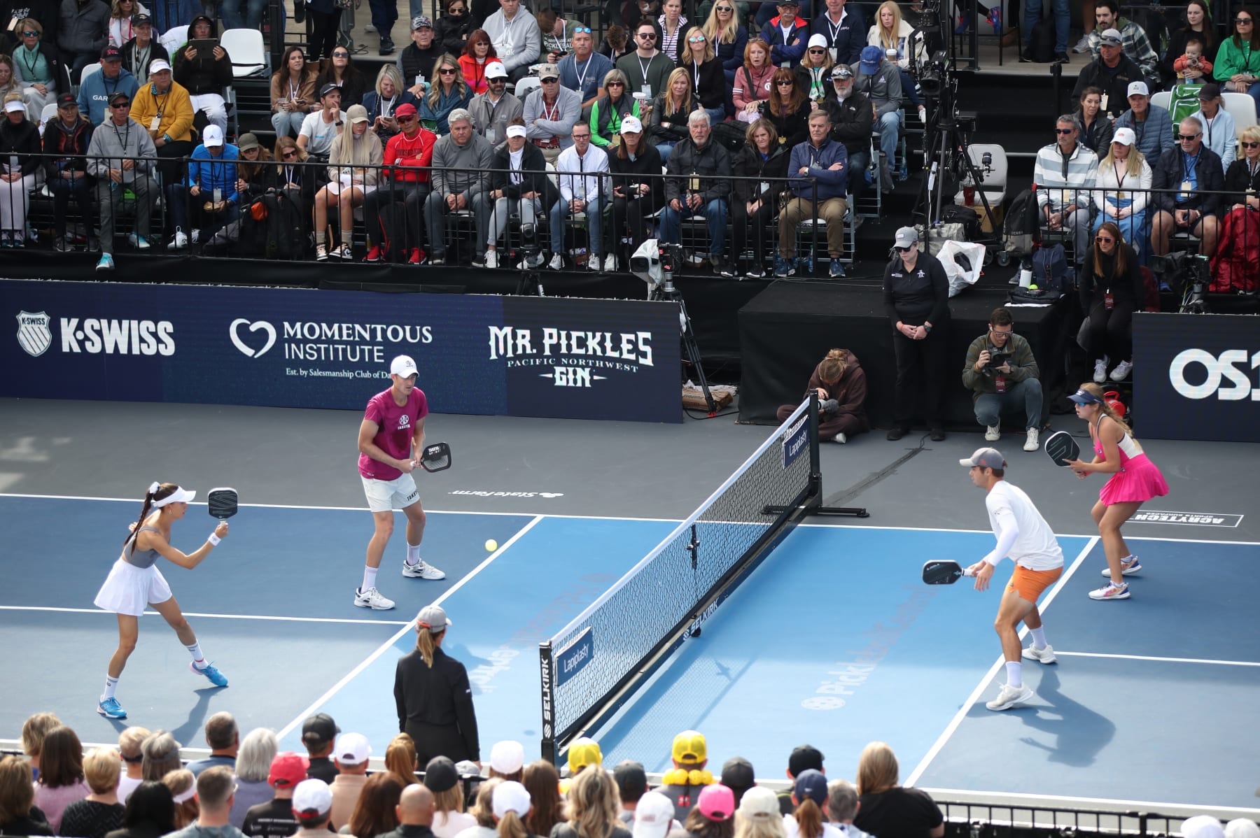 DALLAS, TEXAS - NOVEMBER 11: Parris Todd hits a forehand volley shot against Ben Johns and Anna Leigh Waters in the semifinals of the Pro Mixed Doubles division at the 2023 BioFreeze USA Pickleball National Championships held at the Brookhaven Country Club on November 11, 2023 in Dallas, Texas. (Photo by Bruce Yeung/Getty Images)