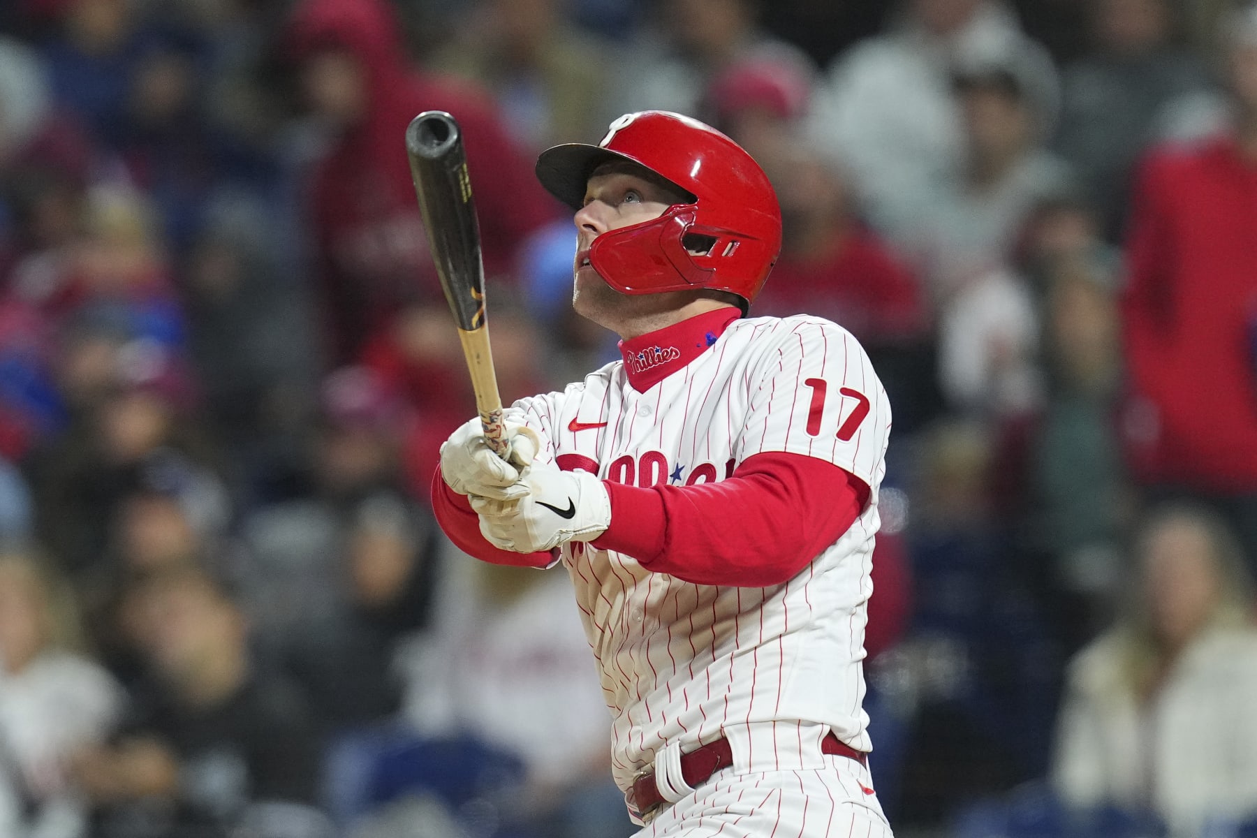 PHILADELPHIA, PA - SEPTEMBER 23: Rhys Hoskins #17 of the Philadelphia Phillies hits a two run home run in the bottom of the fourth inning against the Atlanta Braves at Citizens Bank Park on September 23, 2022 in Philadelphia, Pennsylvania. (Photo by Mitchell Leff/Getty Images)