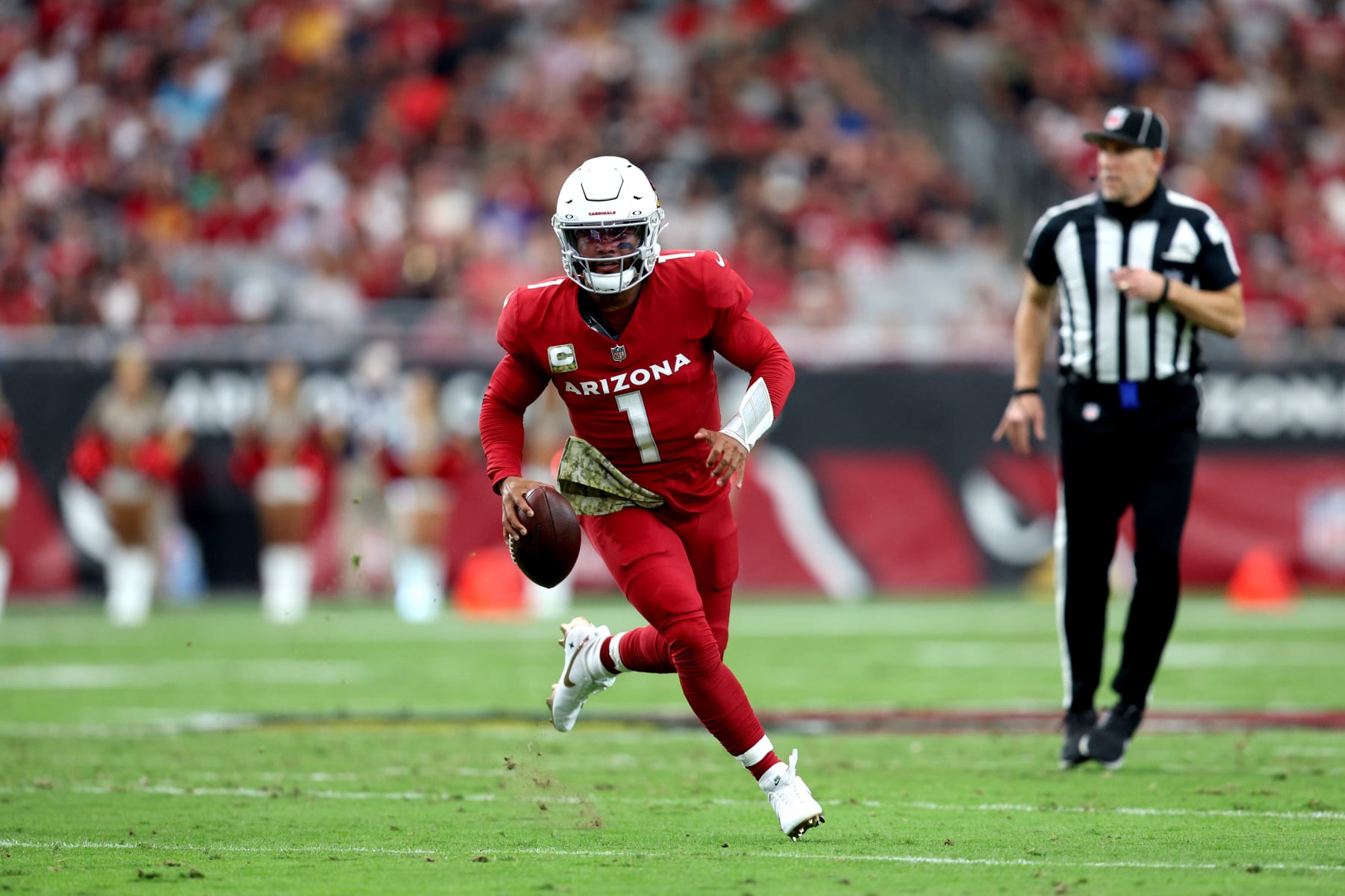 GLENDALE, ARIZONA - NOVEMBER 12: Kyler Murray #1 of the Arizona Cardinals runs with the ball against the Atlanta Falcons during the first quarter at State Farm Stadium on November 12, 2023 in Glendale, Arizona. (Photo by Mike Christy/Getty Images)