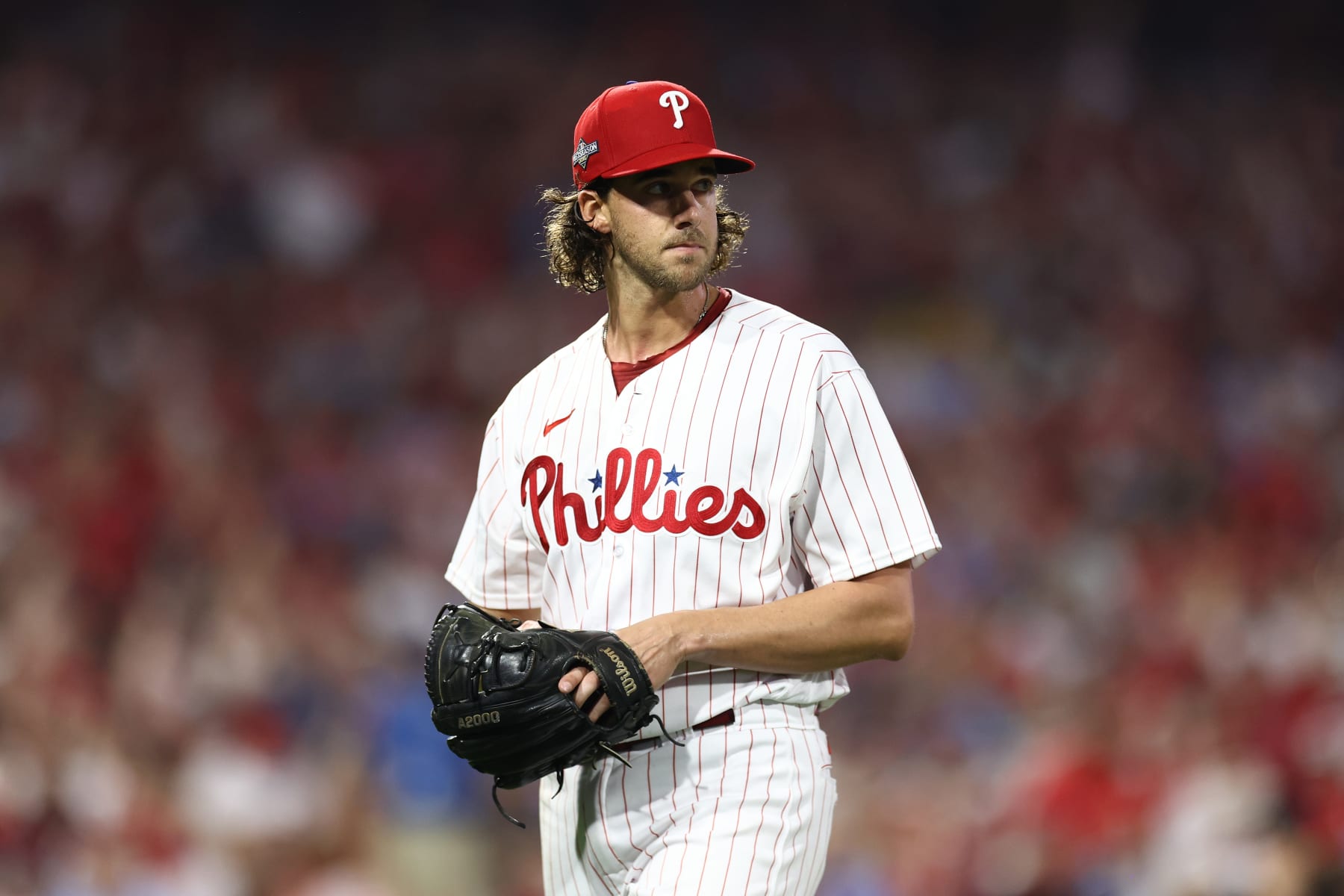 PHILADELPHIA, PENNSYLVANIA - OCTOBER 04: Aaron Nola #27 of the Philadelphia Phillies looks on during the first inning against the Miami Marlins in Game Two of the Wild Card Series at Citizens Bank Park on October 04, 2023 in Philadelphia, Pennsylvania. (Photo by Tim Nwachukwu/Getty Images)