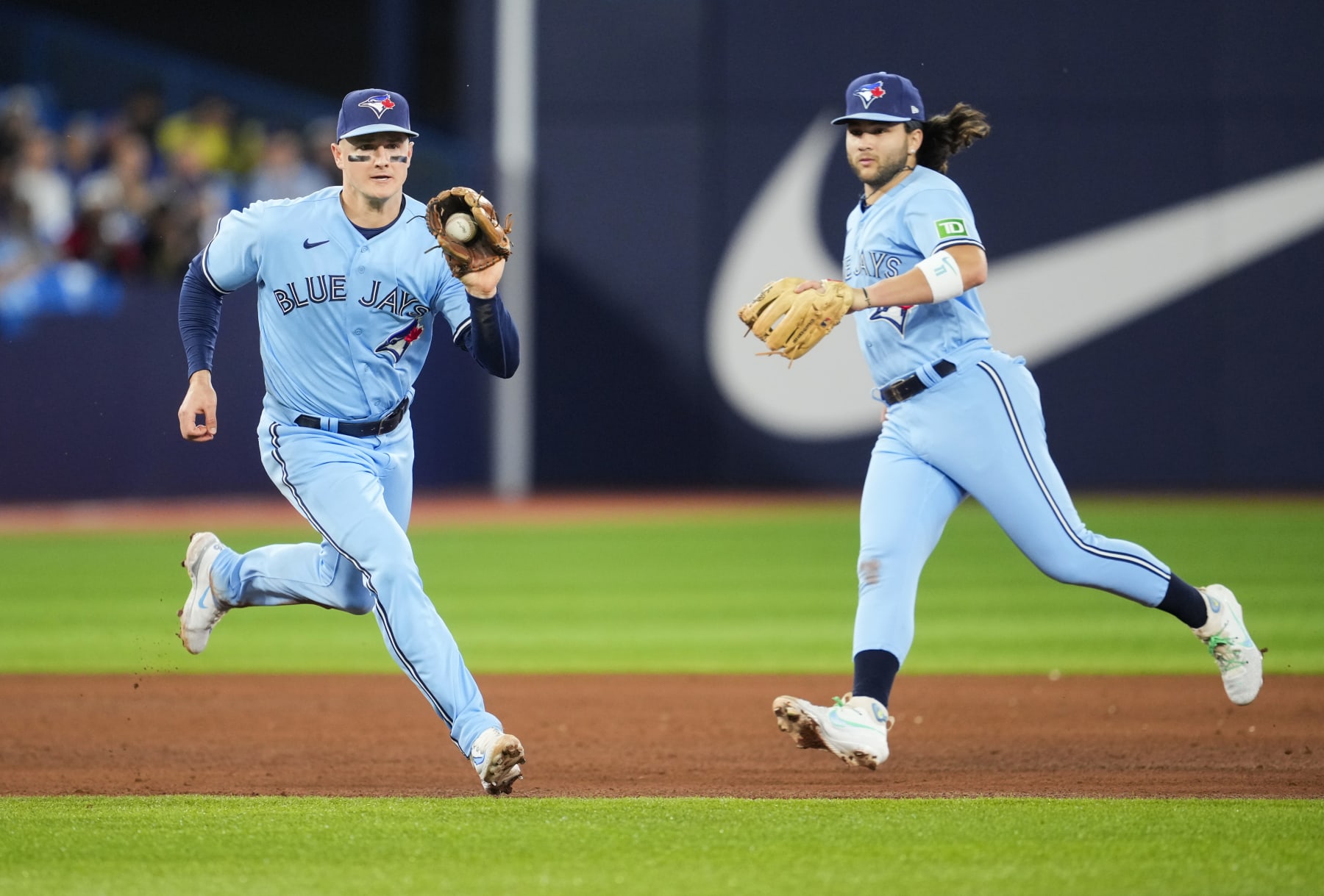 Matt Chapman (L) and Bo Bichette (R)