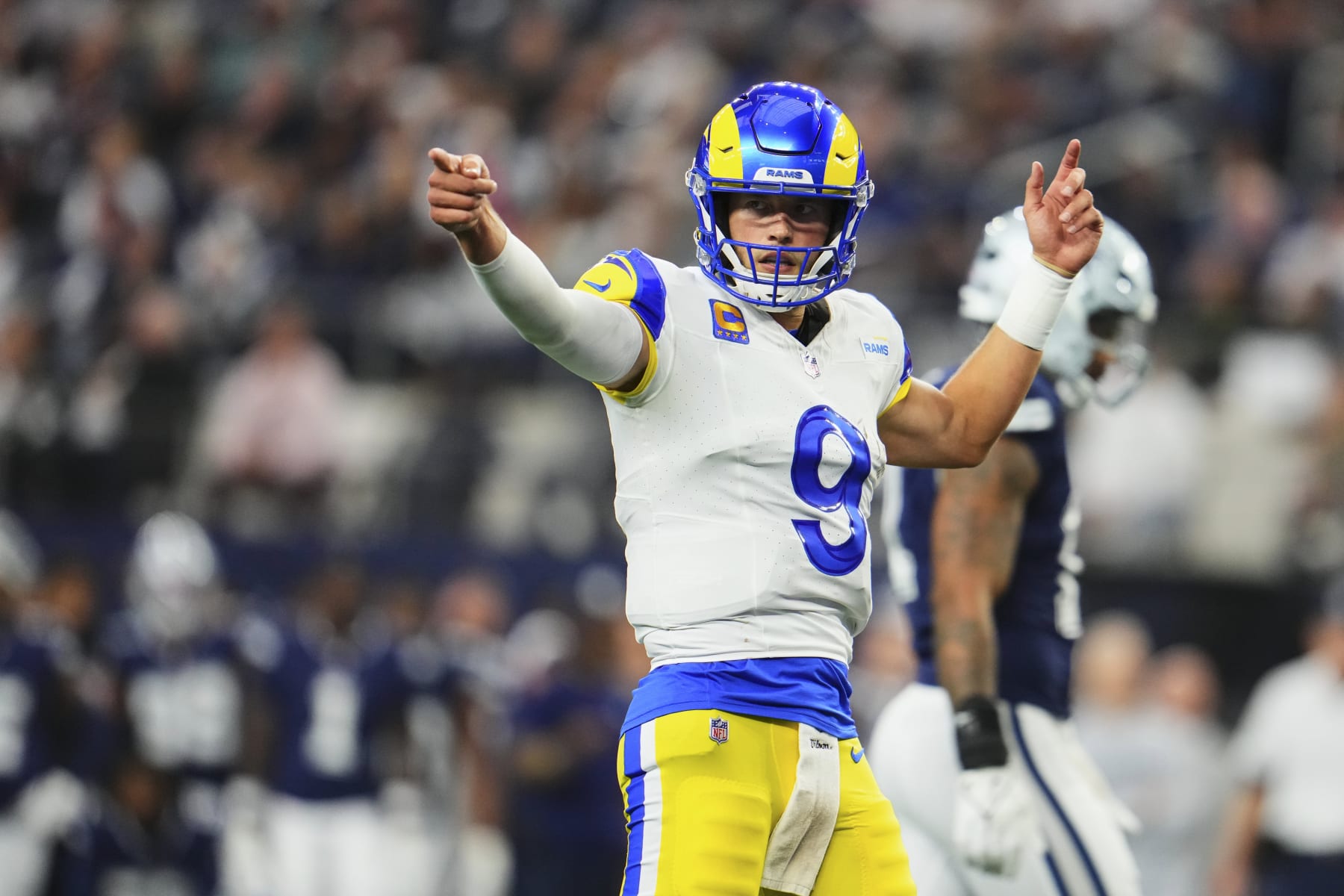 ARLINGTON, TX - OCTOBER 29: Matthew Stafford #9 of the Los Angeles Rams celebrates after scoring a touchdown against the Dallas Cowboys at AT&T Stadium on October 29, 2023 during the first half in Arlington, Texas. (Photo by Cooper Neill/Getty Images)
