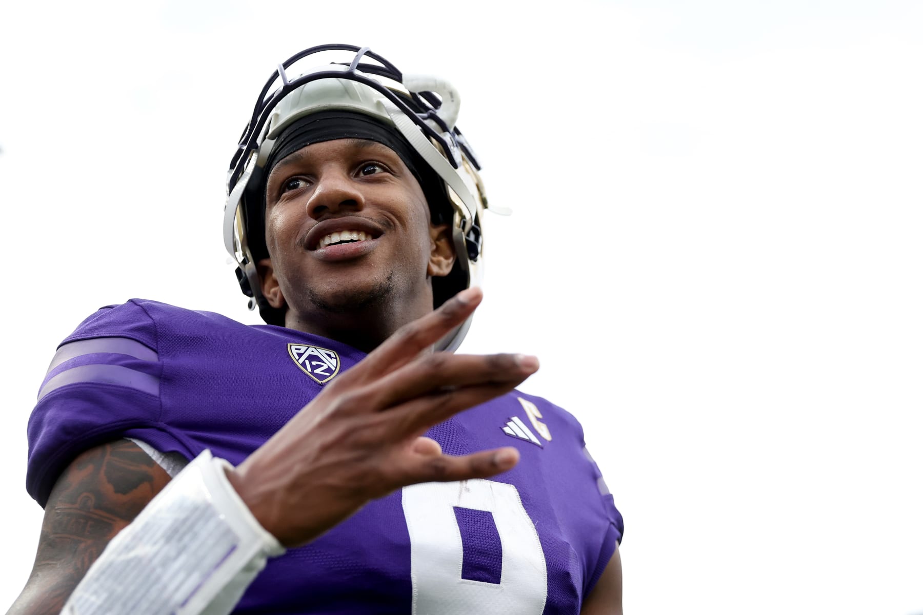 SEATTLE, WASHINGTON - NOVEMBER 11: Michael Penix Jr. #9 of the Washington Huskies reacts after beating Utah Utes 35-28 at Husky Stadium on November 11, 2023 in Seattle, Washington. (Photo by Steph Chambers/Getty Images)