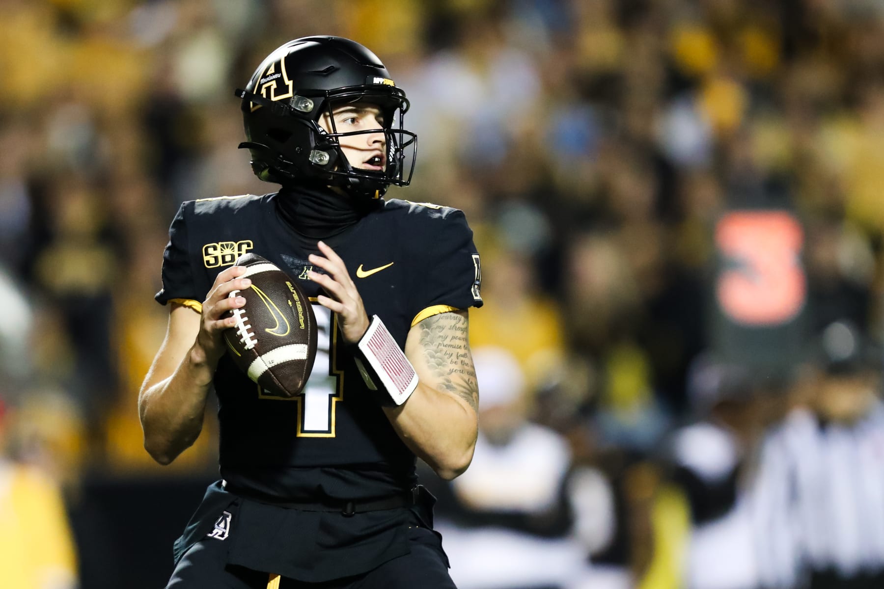 BOONE, NC - OCTOBER 10: Joey Aguilar #4 of the Appalachian State Mountaineers looks to throw the ball during a football game against the Coastal Carolina Chanticleers at Kidd Brewer Stadium in Boone, North Carolina on Oct 10, 2023. (Photo by David Jensen/Icon Sportswire via Getty Images)