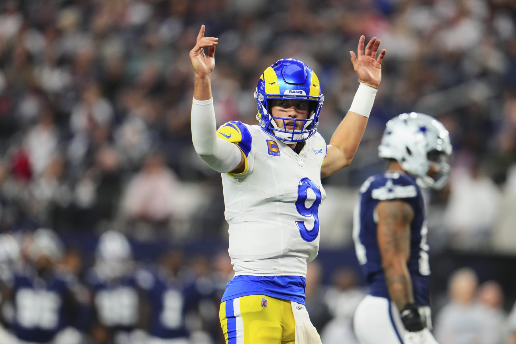 ARLINGTON, TX - OCTOBER 29: Matthew Stafford #9 of the Los Angeles Rams celebrates after scoring a touchdown against the Dallas Cowboys at AT&T Stadium on October 29, 2023 during the first half in Arlington, Texas. (Photo by Cooper Neill/Getty Images)