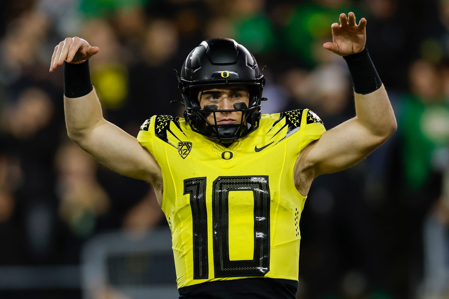 EUGENE, OREGON - NOVEMBER 11: Bo Nix #10 of the Oregon Ducks gestures to the crowd during a game against the USC Trojans at Autzen Stadium on November 11, 2023 in Eugene, Oregon. (Photo by Brandon Sloter/Image Of Sport/Getty Images)