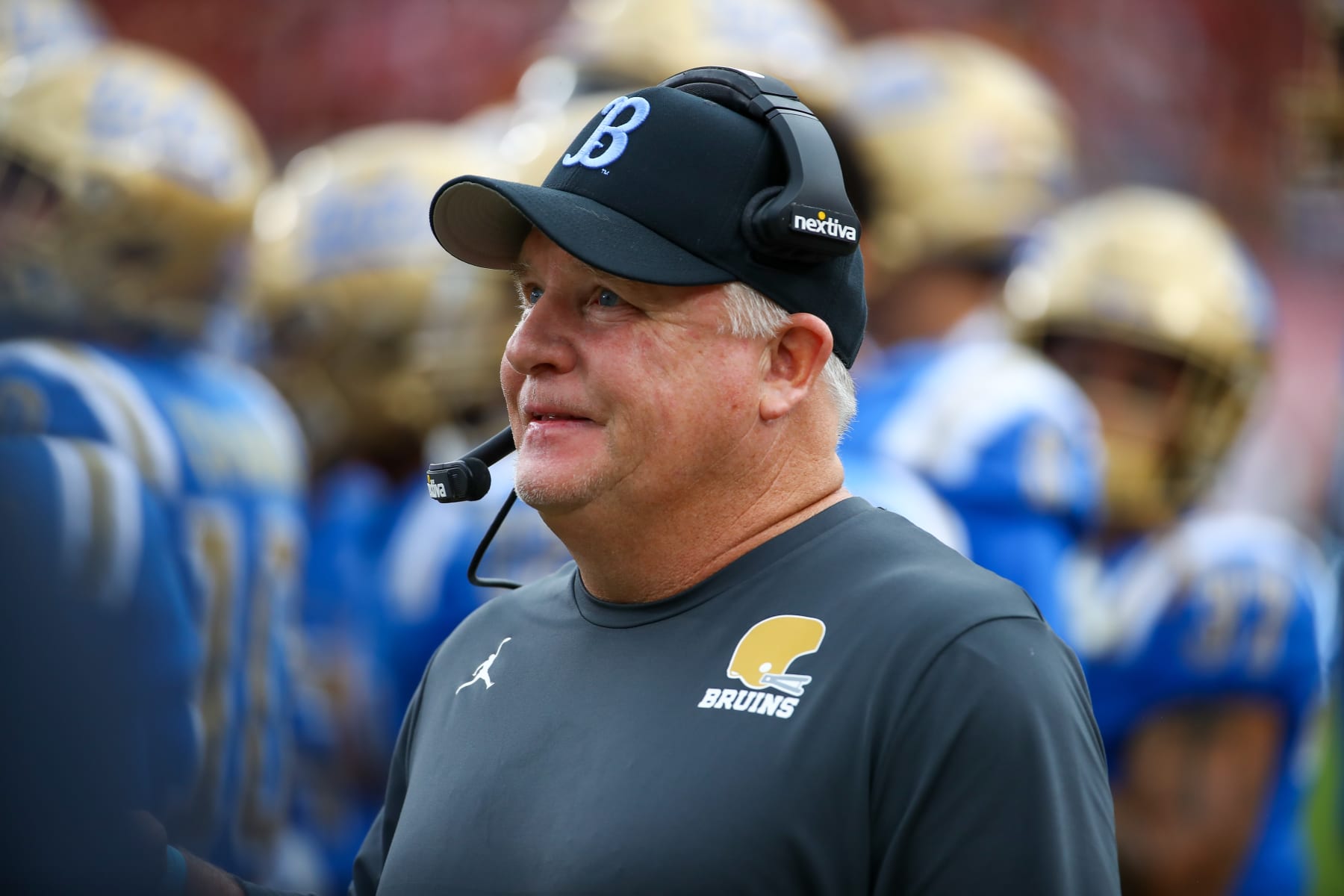 LOS ANGELES, CA - NOVEMBER 18: UCLA Bruins head coach Chip Kelly looks at the scoreboard during the UCLA Bruins vs USC Trojans game on November 18, 2023, at the Los Angeles Memorial Coliseum in Los Angeles, CA. (Photo by Jevone Moore/Icon Sportswire via Getty Images)