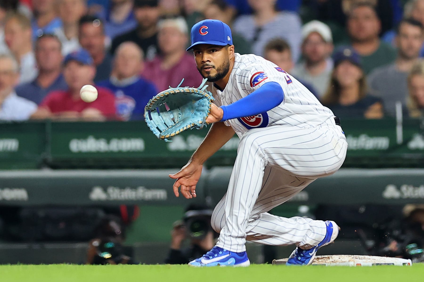 CHICAGO, ILLINOIS - AUGUST 28: Jeimer Candelario #9 of the Chicago Cubs in action against the Milwaukee Brewers at Wrigley Field on August 28, 2023 in Chicago, Illinois. (Photo by Michael Reaves/Getty Images)