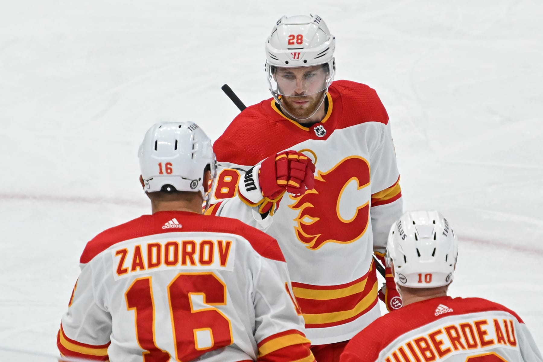 TORONTO, ON - NOVEMBER 10: Calgary Flames Defenceman Nikita Zadorov (16) celebrates a second period goal with Center Elias Lindholm (28) during the regular season NHL game between the Calgary Flames and Toronto Maple Leafs on November 10, 2023 at Scotiabank Arena in Toronto, ON. (Photo by Gerry Angus/Icon Sportswire via Getty Images)