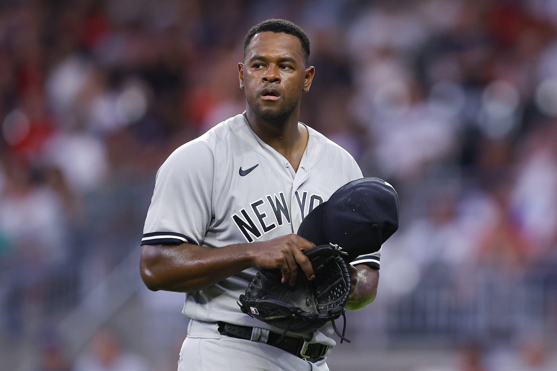 ATLANTA, GEORGIA - AUGUST 15: Luis Severino #40 of the New York Yankees heads to the dugout during the fourth inning against the Atlanta Braves at Truist Park on August 15, 2023 in Atlanta, Georgia. (Photo by Todd Kirkland/Getty Images)