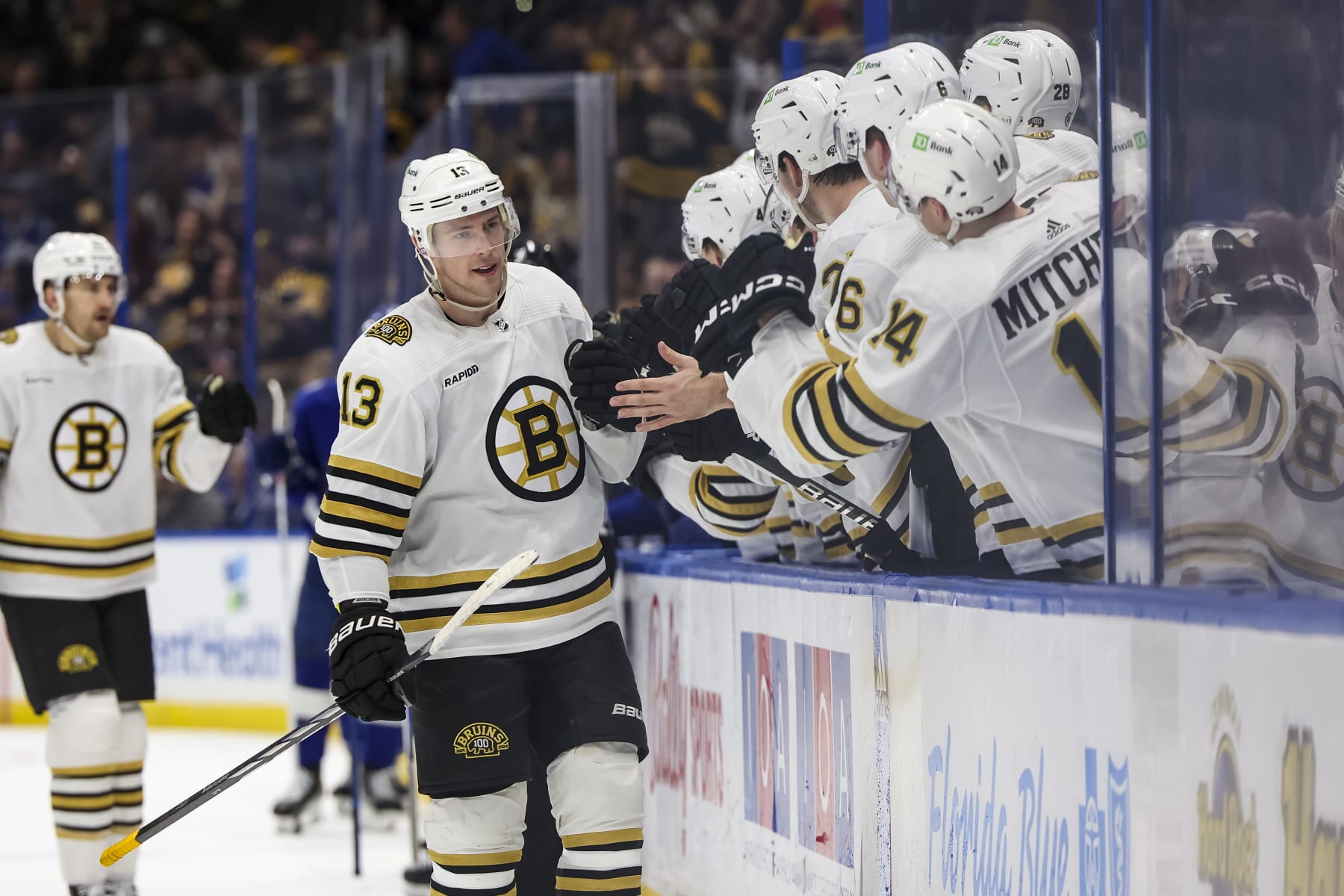 TAMPA, FL - NOVEMBER 20: Charlie Coyle #13 of the Boston Bruins celebrates a goal against the Tampa Bay Lightning during the third period at Amalie Arena on November 20, 2023 in Tampa, Florida. (Photo by Mark LoMoglio/NHLI via Getty Images)