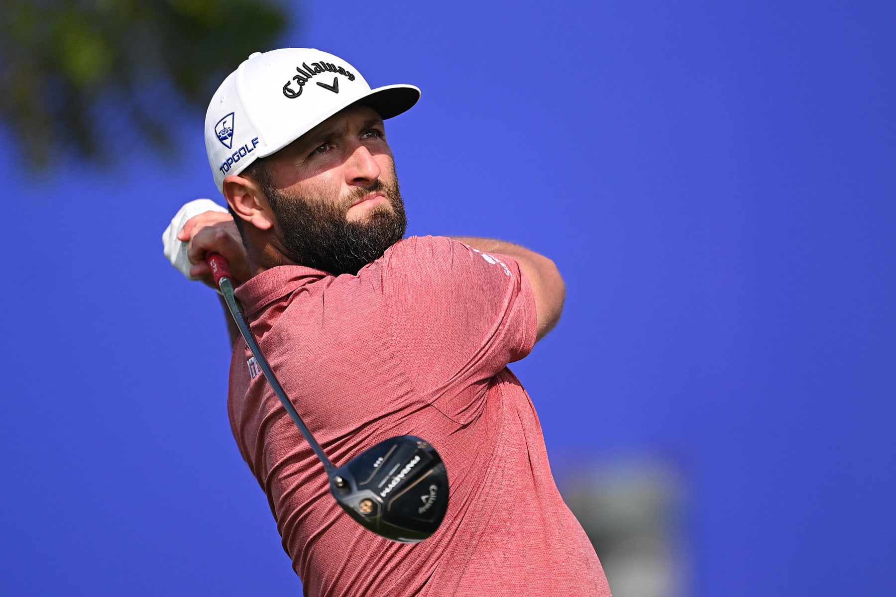 DUBAI, UNITED ARAB EMIRATES - NOVEMBER 19: Jon Rahm of Spain tees off on the 14th hole during Day Four of the DP World Tour Championship on the Earth Course at Jumeirah Golf Estates on November 19, 2023 in Dubai, United Arab Emirates. (Photo by Ross Kinnaird/Getty Images)