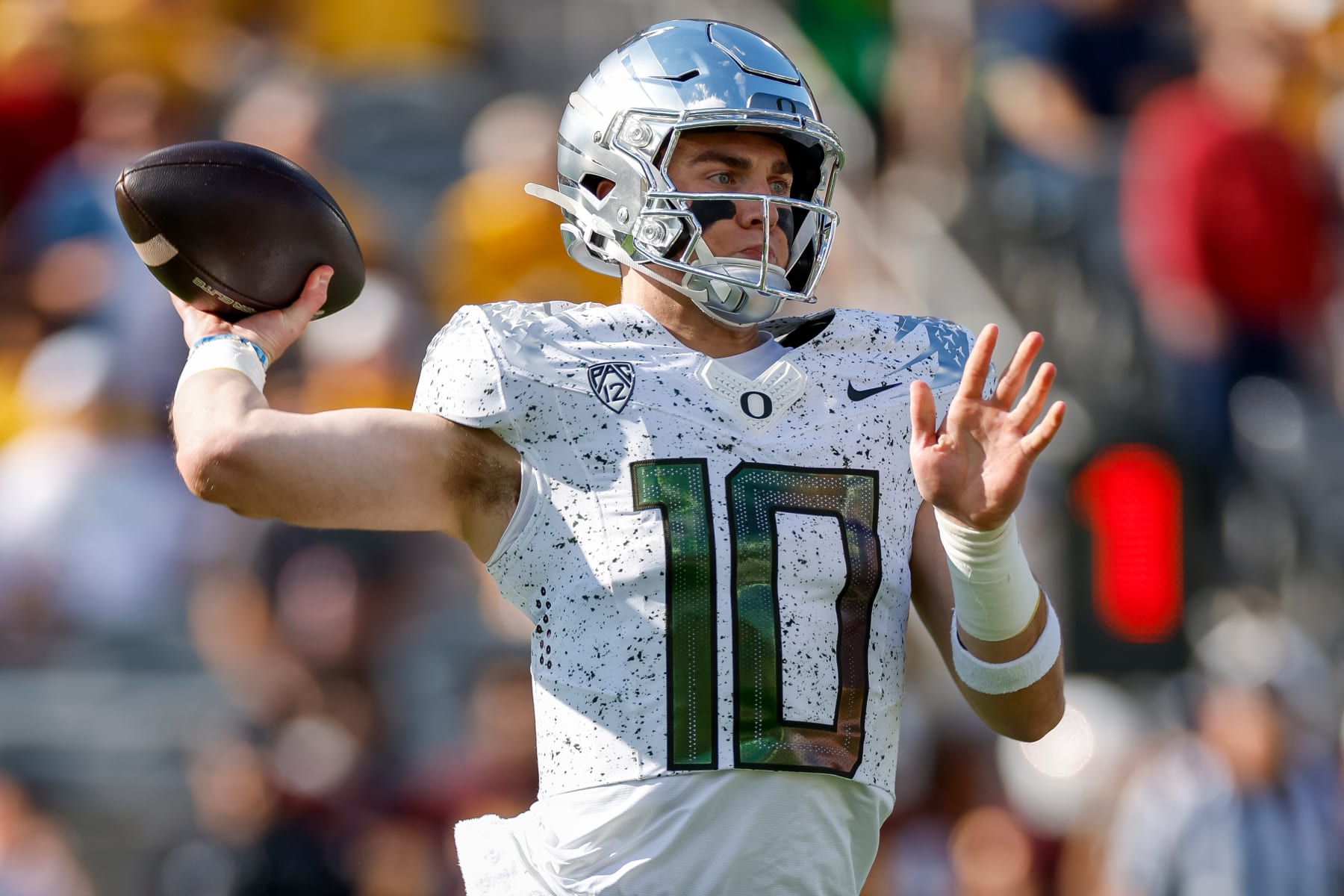 TEMPE, ARIZONA - NOVEMBER 18: Bo Nix #10 of the Oregon Ducks passes the ball in the first quarter during a game against the Arizona State Sun Devils at Mountain America Stadium on November 18, 2023 in Tempe, Arizona. (Photo by Brandon Sloter/Image Of Sport/Getty Images)