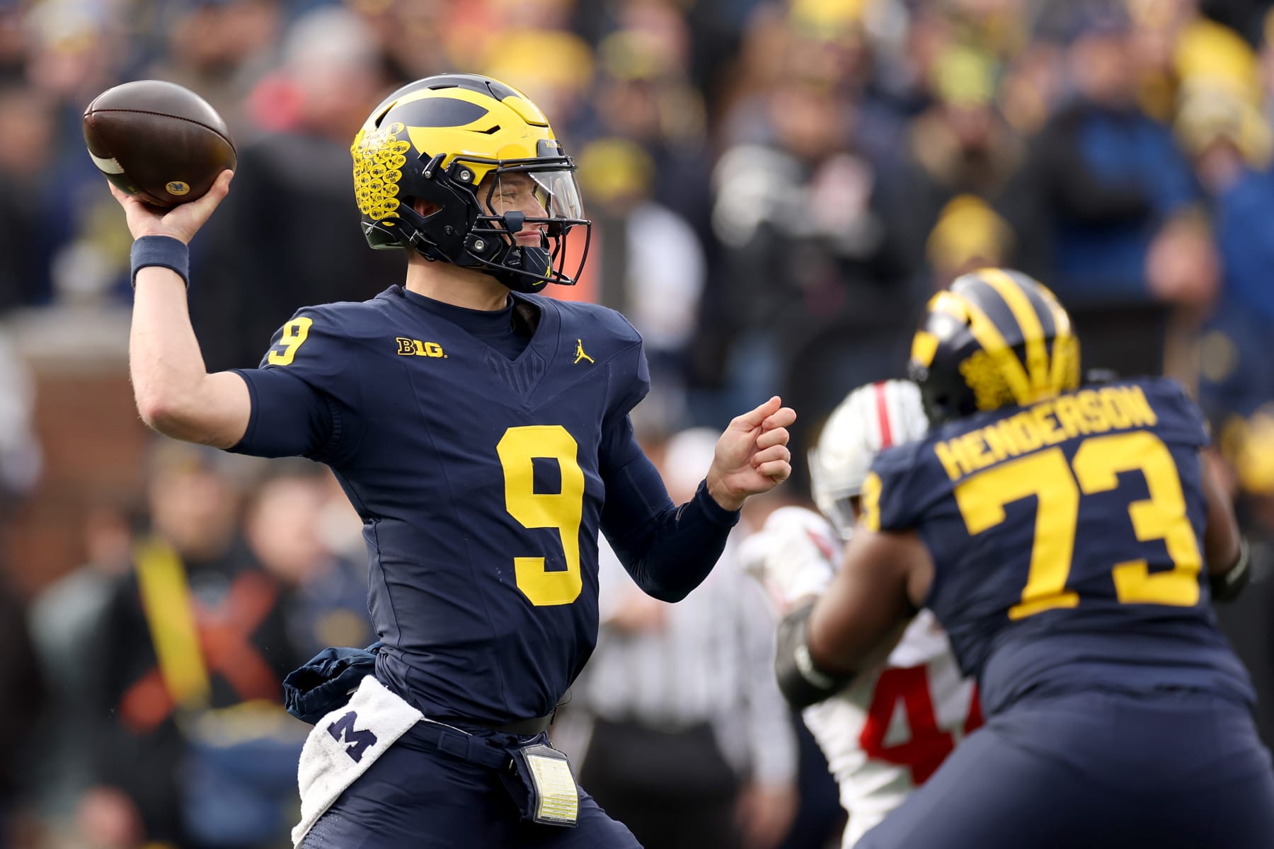 ANN ARBOR, MICHIGAN - NOVEMBER 25: J.J. McCarthy #9 of the Michigan Wolverines throws a pass against the Ohio State Buckeyes during the third quarter in the game at Michigan Stadium on November 25, 2023 in Ann Arbor, Michigan. (Photo by Ezra Shaw/Getty Images)