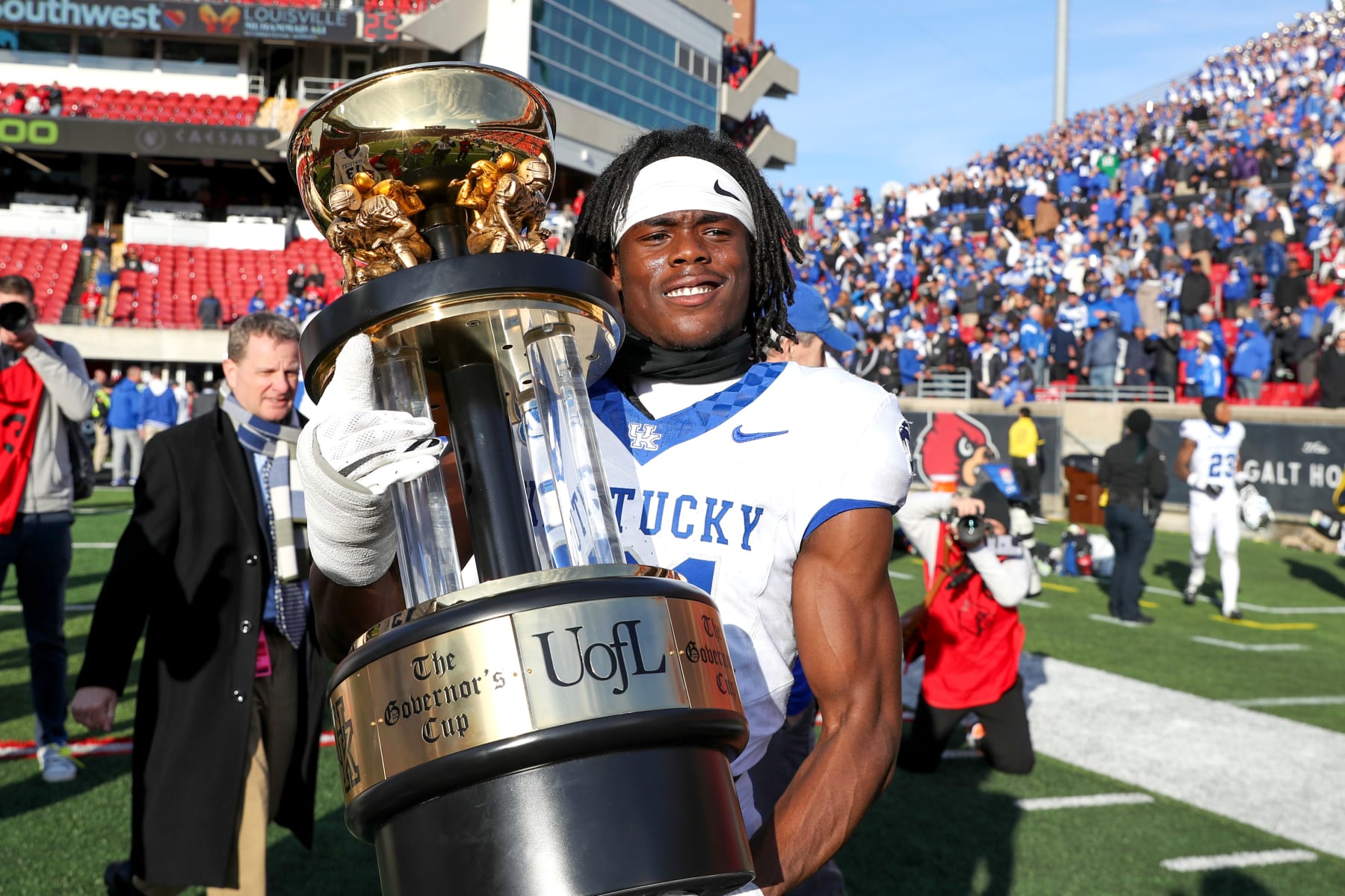 LOUISVILLE, KY - NOVEMBER 25: Kentucky Wildcats defensive back Maxwell Hairston (31) poses with the The Governor's Cup following the college football game between the Kentucky Wildcats and Louisville Cardinals on November 25, 2023, at L&N Federal Credit Union Stadium in Louisville, KY. (Photo by Frank Jansky/Icon Sportswire via Getty Images)