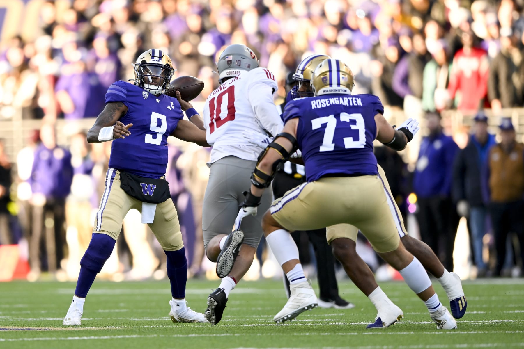 SEATTLE, WASHINGTON - NOVEMBER 25: Michael Penix Jr. #9 of the Washington Huskies throws the ball during the second quarter against the Washington State Cougars at Husky Stadium on November 25, 2023 in Seattle, Washington. (Photo by Alika Jenner/Getty Images)