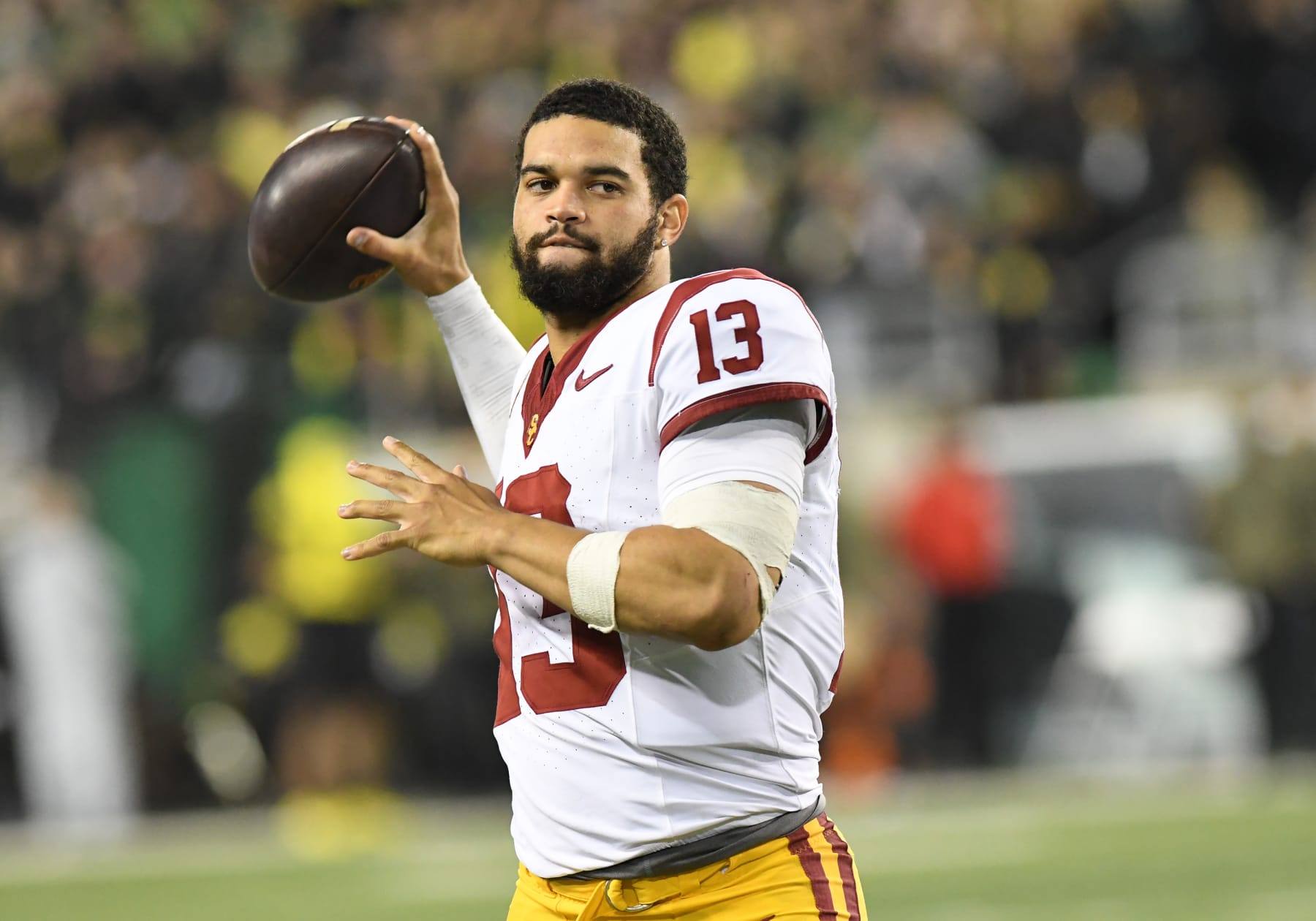 EUGENE, OR - NOVEMBER 11: USC Trojans quarterback Caleb Williams (13) plays catch on the sideline during a break in play during a college football game between the Oregon Ducks and USC Trojans on November 11, 2023, at Autzen Stadium in Eugene, Oregon.(Photo by Brian Murphy/Icon Sportswire via Getty Images)