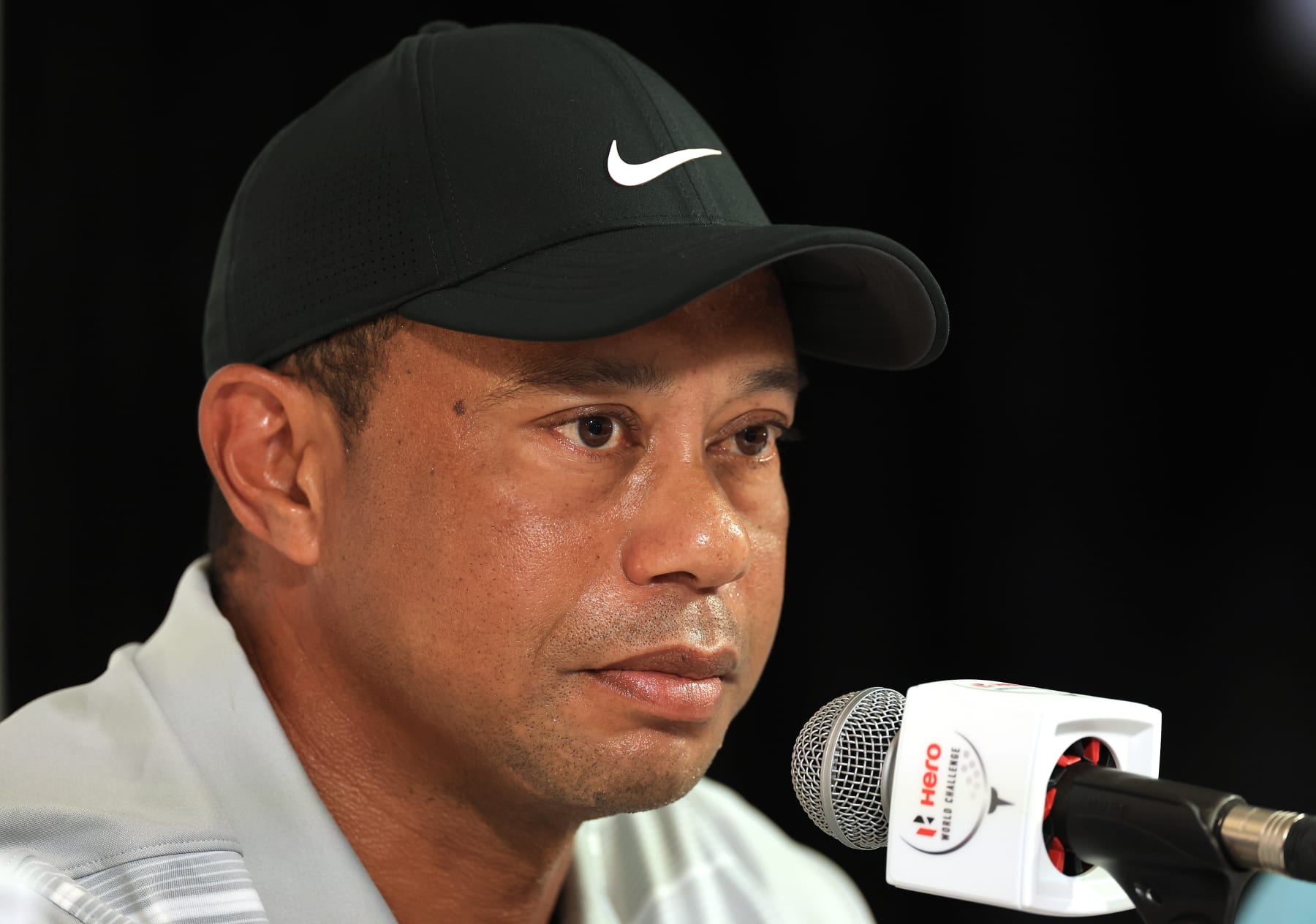 NASSAU, BAHAMAS - NOVEMBER 28: Tiger Woods of The United States speaks to the media during his pre-tournament media conference prior to the Hero World Challenge at Albany Golf Course on November 28, 2023 in Nassau, . (Photo by David Cannon/Getty Images)