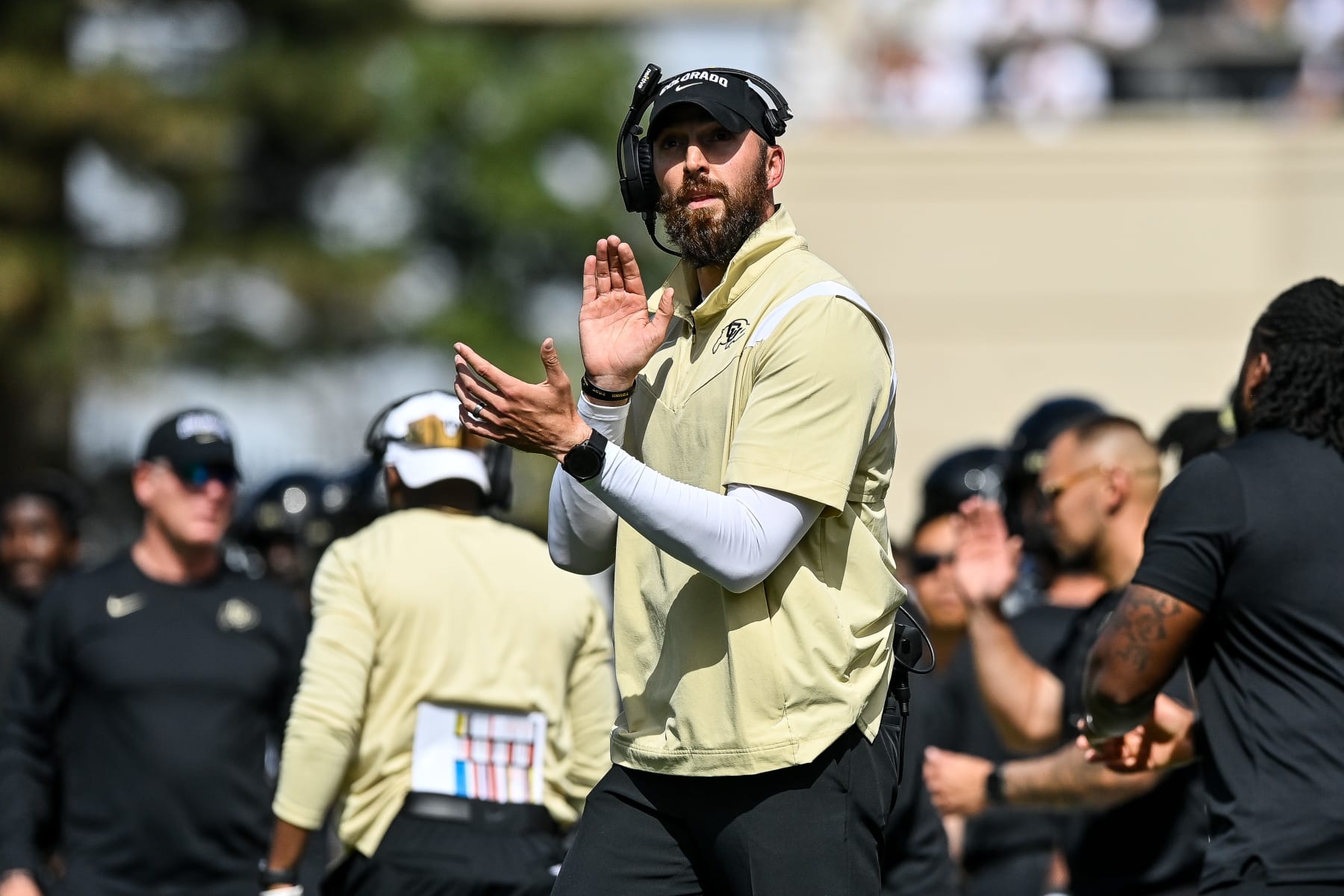 BOULDER, CO - SEPTEMBER 30: Offensive coordinator Sean Lewis of the Colorado Buffaloes claps after an offensive touchdown in the fourth quarter against the USC Trojans at Folsom Field on September 30, 2023 in Boulder, Colorado. (Photo by Dustin Bradford/Getty Images)