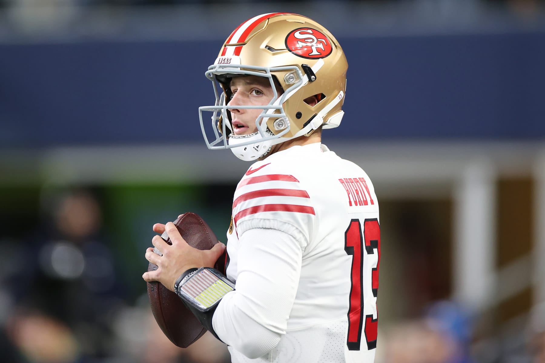 SEATTLE, WASHINGTON - NOVEMBER 23: Brock Purdy #13 of the San Francisco 49ers warms up prior to a game against the Seattle Seahawks at Lumen Field on November 23, 2023 in Seattle, Washington. (Photo by Steph Chambers/Getty Images)
