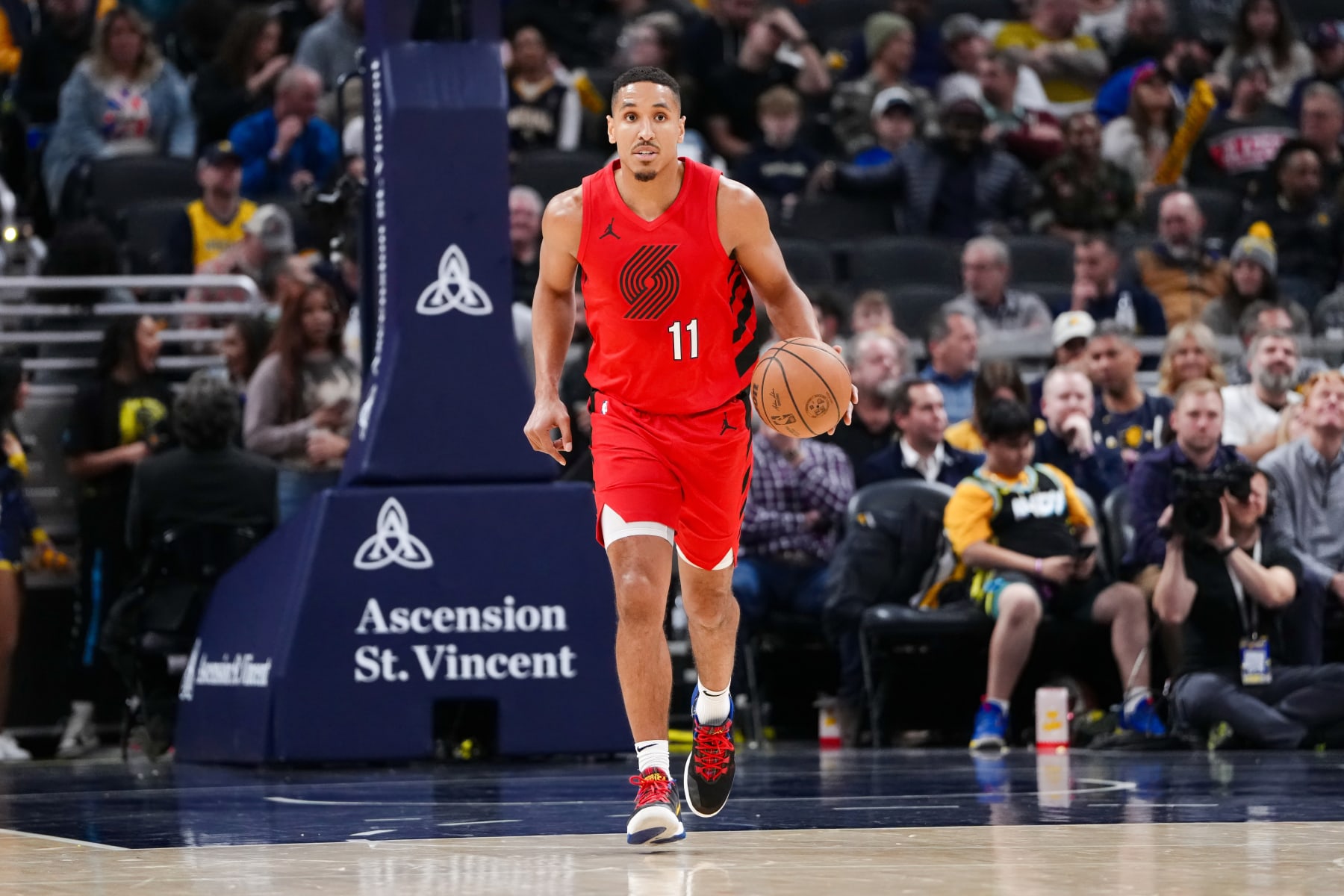 INDIANAPOLIS, INDIANA - NOVEMBER 27: Malcolm Brogdon #11 of the Portland Trail Blazers dribbles the ball in the second quarter against the Indiana Pacers at Gainbridge Fieldhouse on November 27, 2023 in Indianapolis, Indiana. NOTE TO USER: User expressly acknowledges and agrees that, by downloading and or using this photograph, User is consenting to the terms and conditions of the Getty Images License Agreement. (Photo by Dylan Buell/Getty Images)