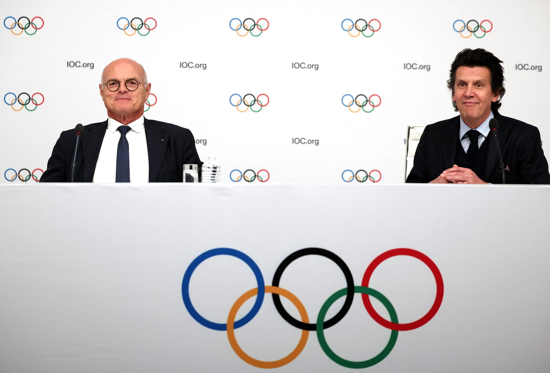 IOC member and Advisory Board Member Karl Stoss of Austria (L) and Olympic Games Executive Director Christophe Dubi attend a press conference after an International Olympic Committee (IOC) Executive Board committee meeting in Paris, on November 29, 2023. The International Olympic Committee on November 29 confirmed the French Alps and Salt Lake City as the sole candidates to host the 2030 and 2034 Winter Games. France, which welcomes the Summer Olympics in 2024, has hosted the Winter Games three times: Chamonix in 1924, Grenoble in 1968 and Albertville in 1992. (Photo by FRANCK FIFE / AFP) (Photo by FRANCK FIFE/AFP via Getty Images)