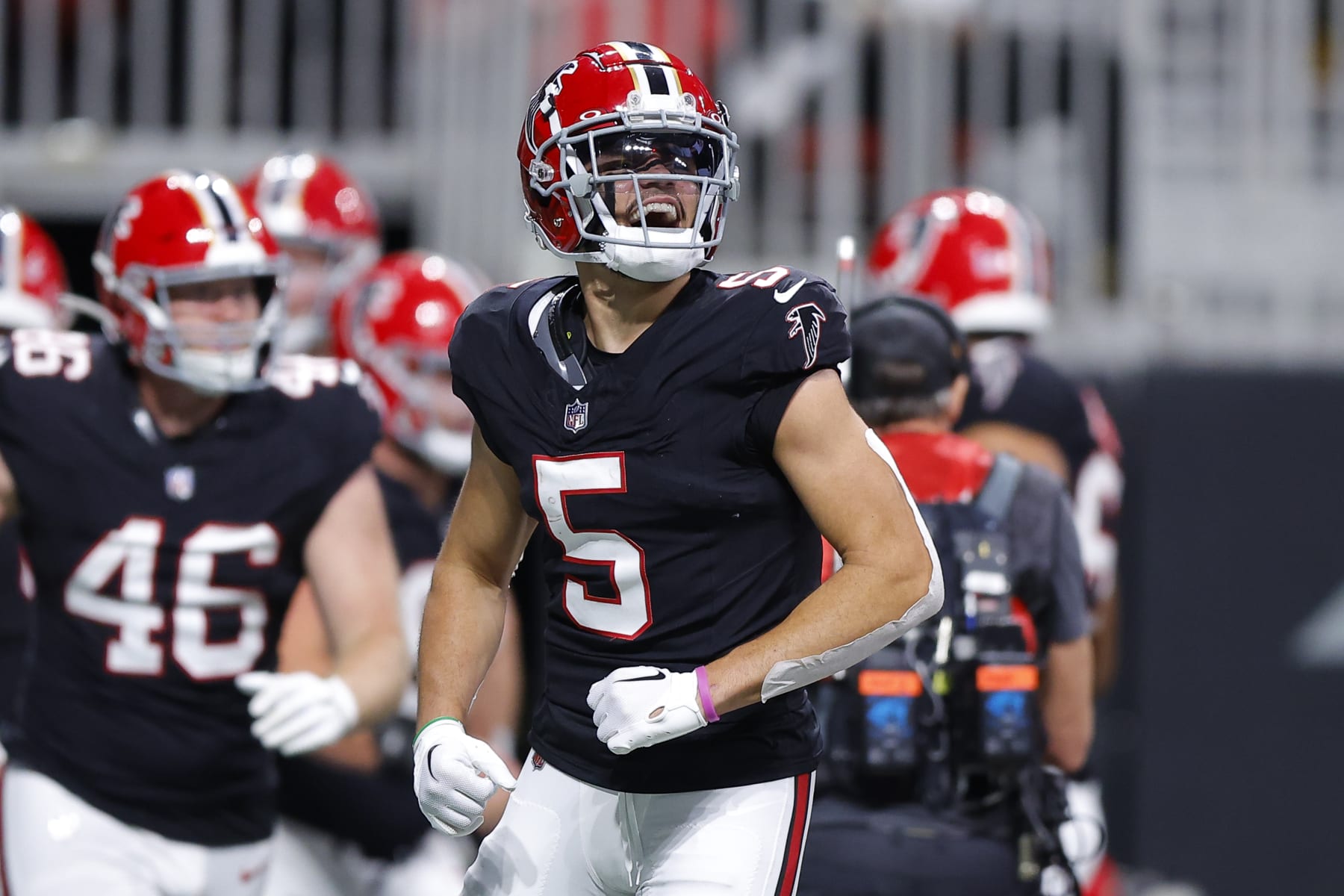 ATLANTA, GEORGIA - NOVEMBER 26: Drake London #5 of the Atlanta Falcons reacts after a Falcons touchdown during the second quarter against the New Orleans Saints at Mercedes-Benz Stadium on November 26, 2023 in Atlanta, Georgia. (Photo by Todd Kirkland/Getty Images)