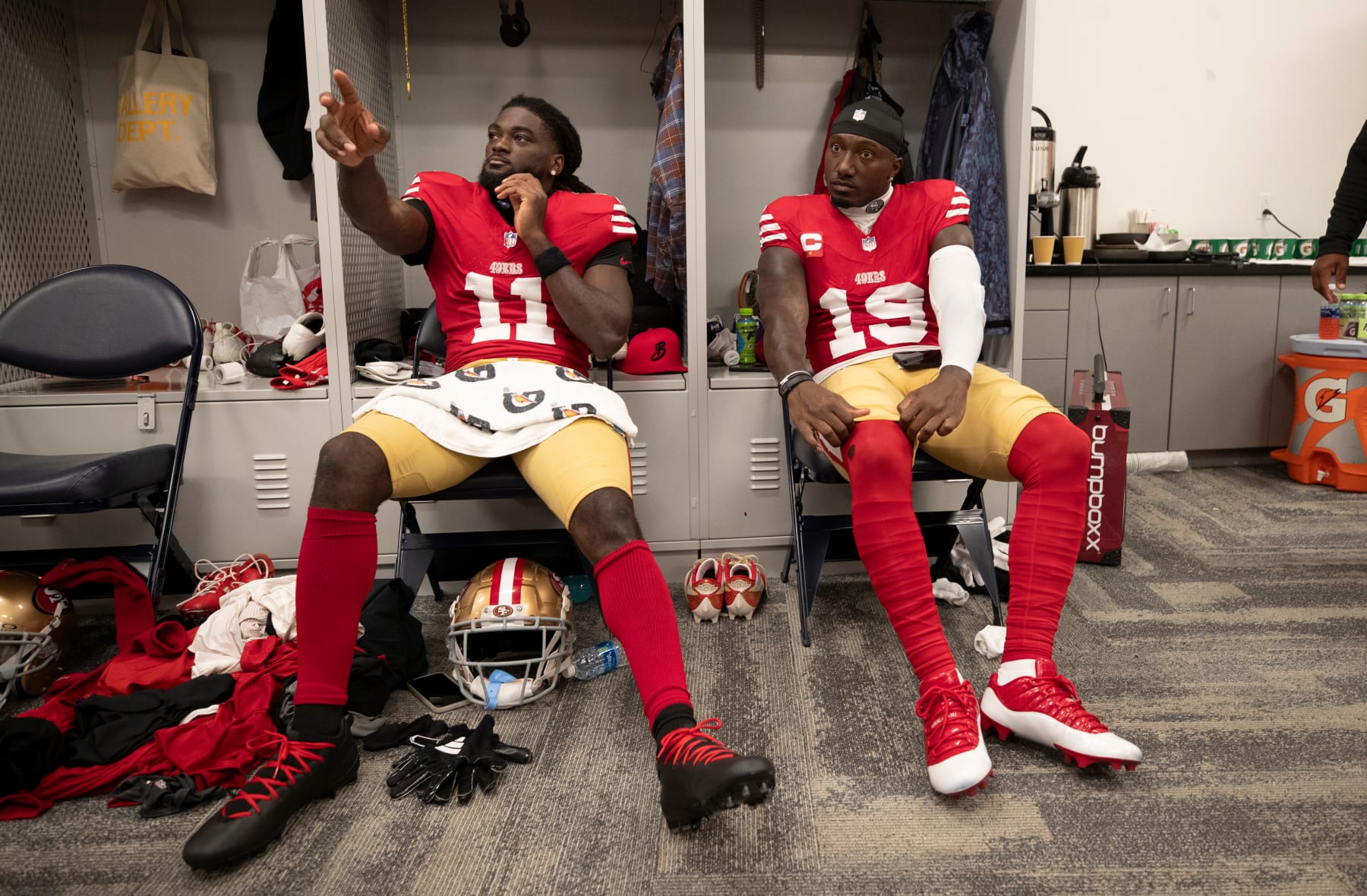 INGLEWOOD, CA - SEPTEMBER 17: Brandon Aiyuk #11 and Deebo Samuel #19 of the San Francisco 49ers in the locker room before the game against the Los Angeles Rams at SoFi Stadium on September 17, 2023 in Inglewood, California. The 49ers defeated the Rams 30-23. (Photo by Michael Zagaris/San Francisco 49ers/Getty Images)