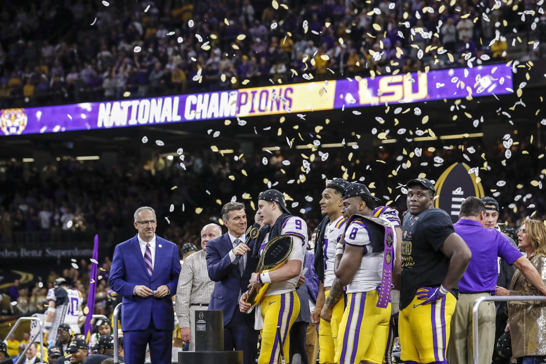 NEW ORLEANS, LA - JANUARY 13: ESPN's Rece Davis interviews Quarterback Joe Burrow #9 of the LSU Tigers on stage after the College Football Playoff National Championship game against the Clemson Tigers at the Mercedes-Benz Superdome on January 13, 2020 in New Orleans, Louisiana. LSU defeated Clemson 42 to 25. (Photo by Don Juan Moore/Getty Images)