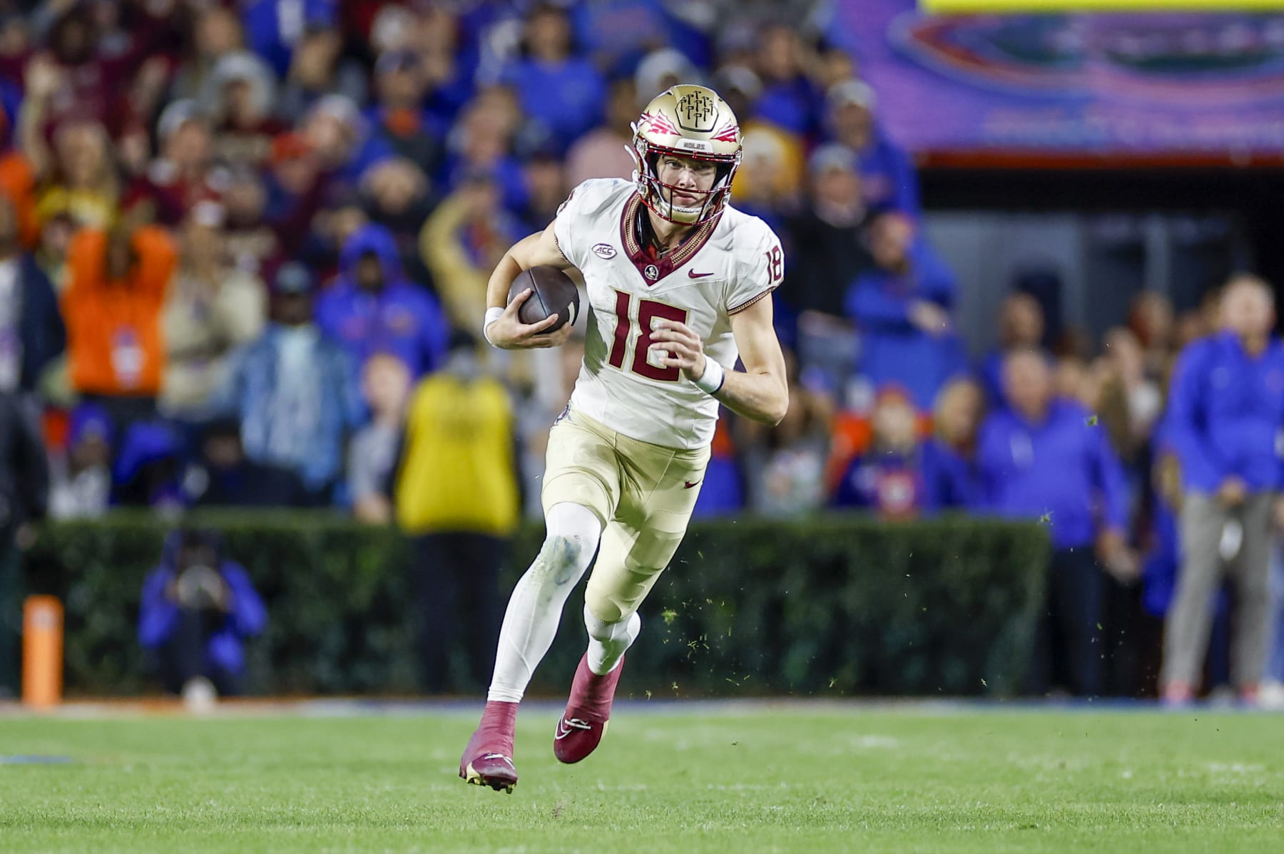 GAINESVILLE, FL - NOVEMBER 25: Florida State Seminoles quarterback Tate Rodemaker (18) runs with the ball during the game between the Florida Gators and the Florida State Seminoles on November 25, 2023 at Ben Hill Griffin Stadium at Florida Field in Gainesville, Fl. (Photo by David Rosenblum/Icon Sportswire via Getty Images)