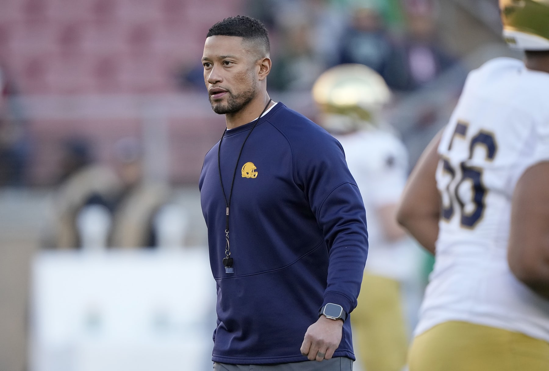 STANFORD, CALIFORNIA - NOVEMBER 25: Head coach Marcus Freeman of the Notre Dame Fighting Irish looks on while his team warms up prior to playing the Stanford Cardinal at Stanford Stadium on November 25, 2023 in Stanford, California. (Photo by Thearon W. Henderson/Getty Images)