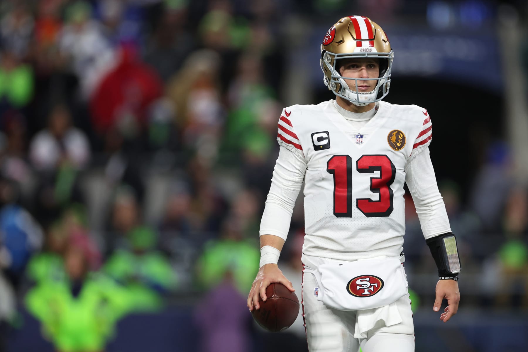 SEATTLE, WASHINGTON - NOVEMBER 23: Brock Purdy #13 of the San Francisco 49ers looks on during the third quarter against the Seattle Seahawks at Lumen Field on November 23, 2023 in Seattle, Washington. (Photo by Steph Chambers/Getty Images)