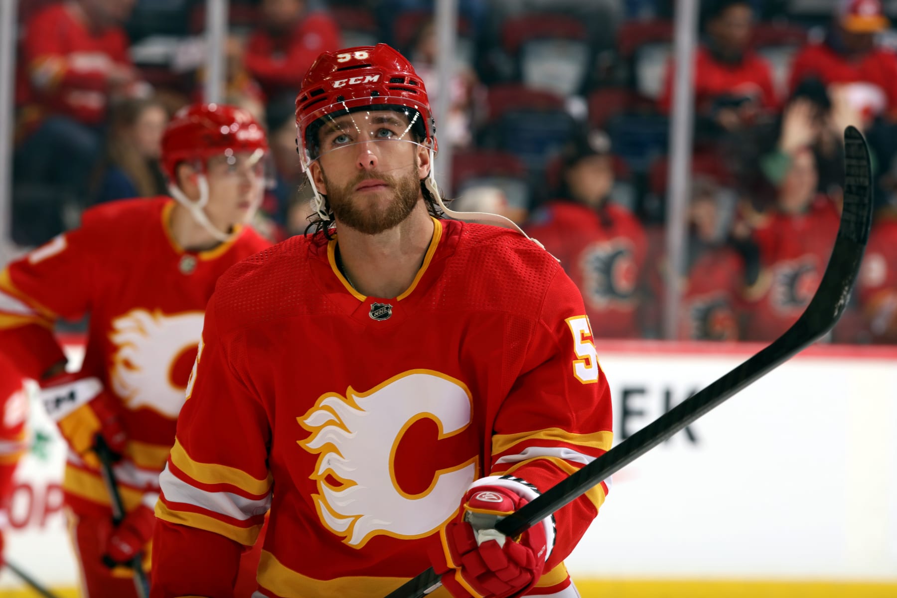 CALGARY, AB - NOVEMBER 30: Noah Hanifin #55 of the Calgary Flames warms up against the Dallas Stars at Scotiabank Saddledome on November 30, 2023 in Calgary, Alberta, Canada. (Photo by Gerry Thomas/NHLI via Getty Images)