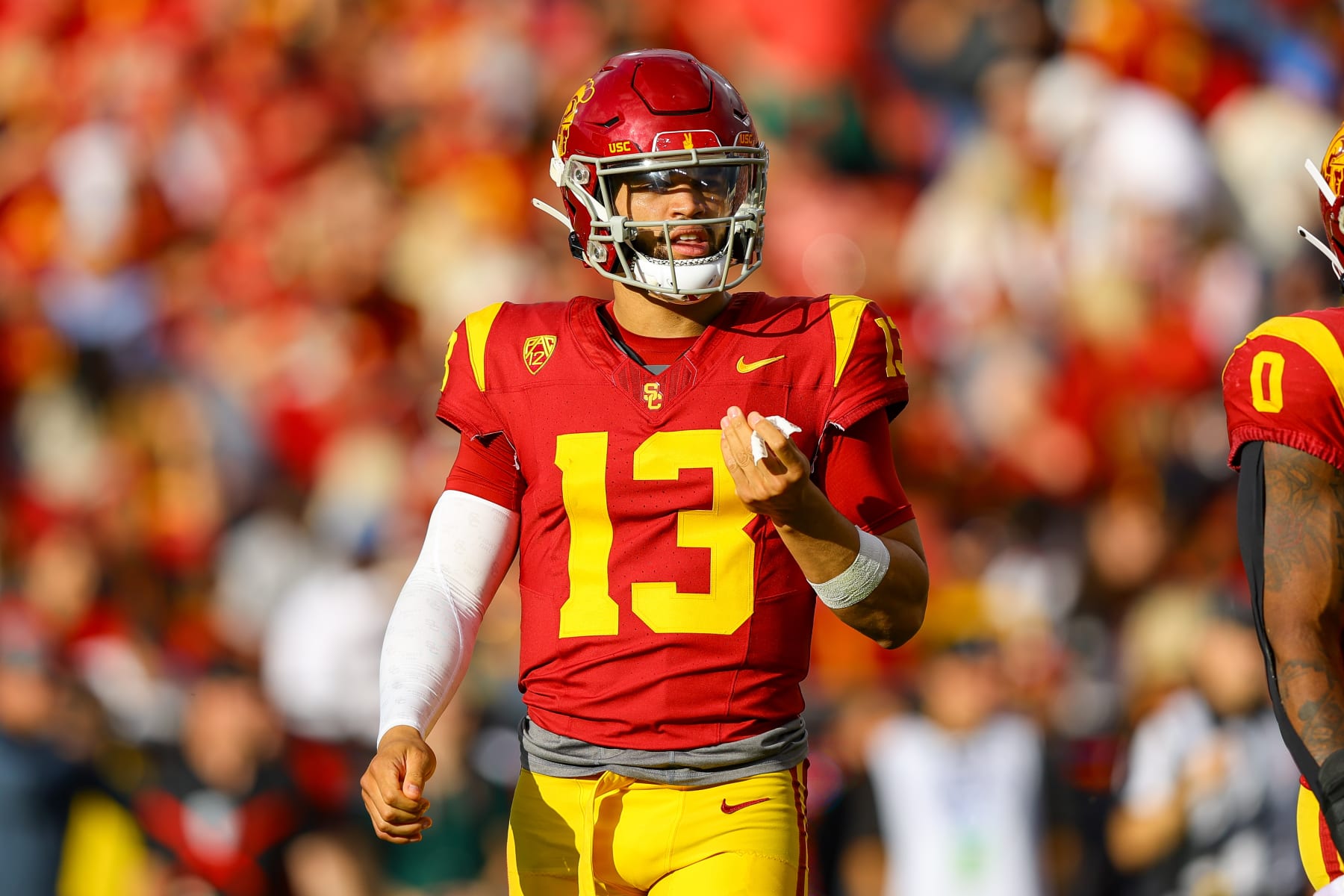 LOS ANGELES, CA - NOVEMBER 18: USC Trojans quarterback Caleb Williams (13) walks onto the field during a college football game between the UCLA Bruins and the USC Trojans on November 18, 2023, at the Los Angeles Memorial Coliseum in Los Angeles, CA. (Photo by Jordon Kelly/Icon Sportswire via Getty Images)