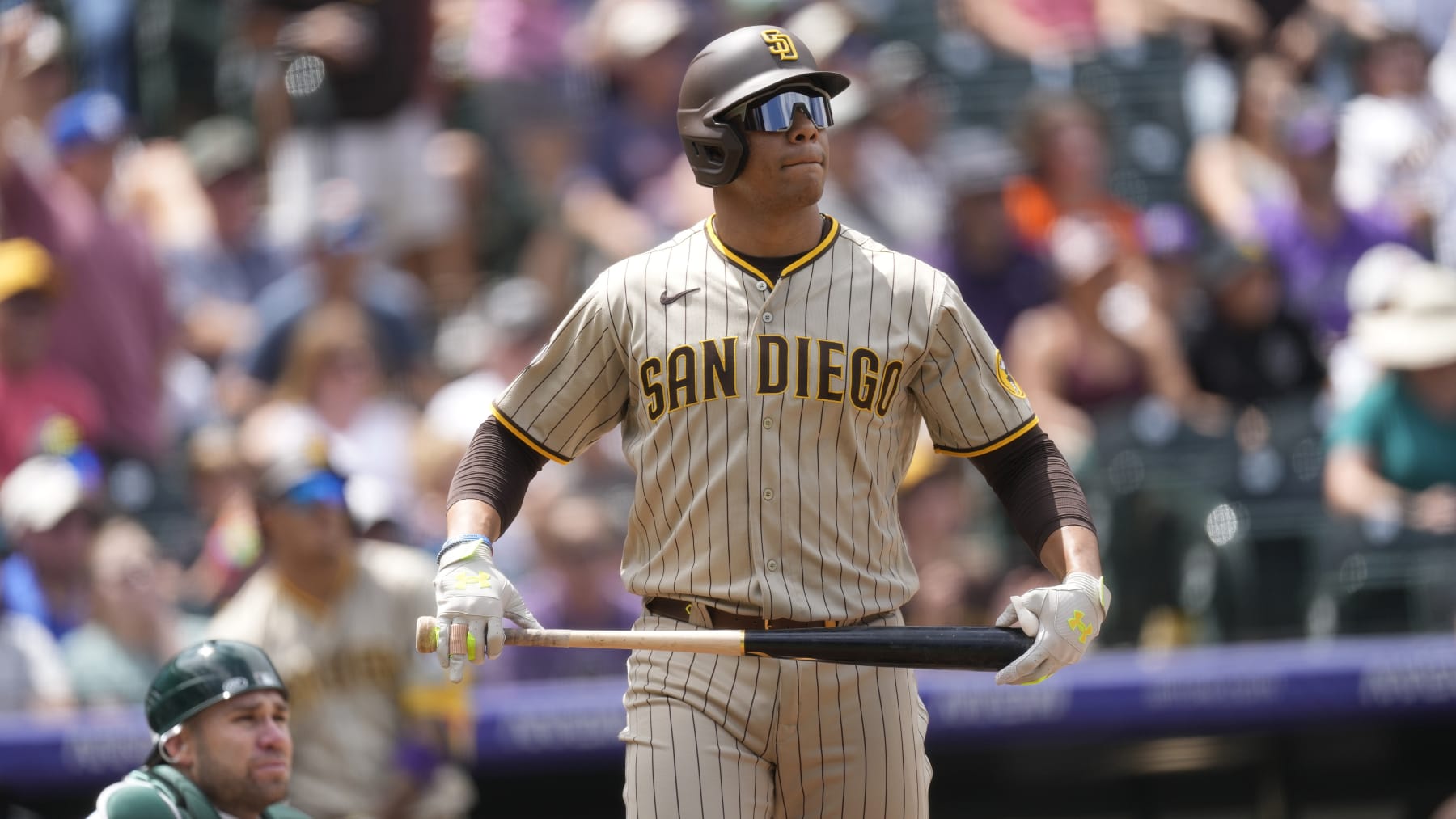 San Diego Padres left fielder Juan Soto (22) in the third inning of a baseball game Wednesday, Aug. 2, 2023, in Denver. (AP Photo/David Zalubowski)