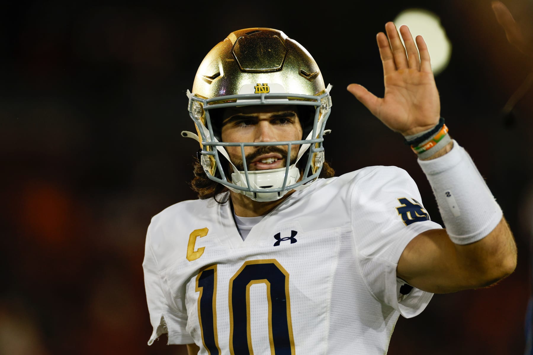 STANFORD, CALIFORNIA - NOVEMBER 25: Sam Hartman #10 of the Notre Dame Fighting Irish celebrates a touchdown in the second half during a game against the Stanford Cardinal at Stanford Stadium on November 25, 2023 in Stanford, California. (Photo by Brandon Sloter/Image Of Sport/Getty Images)