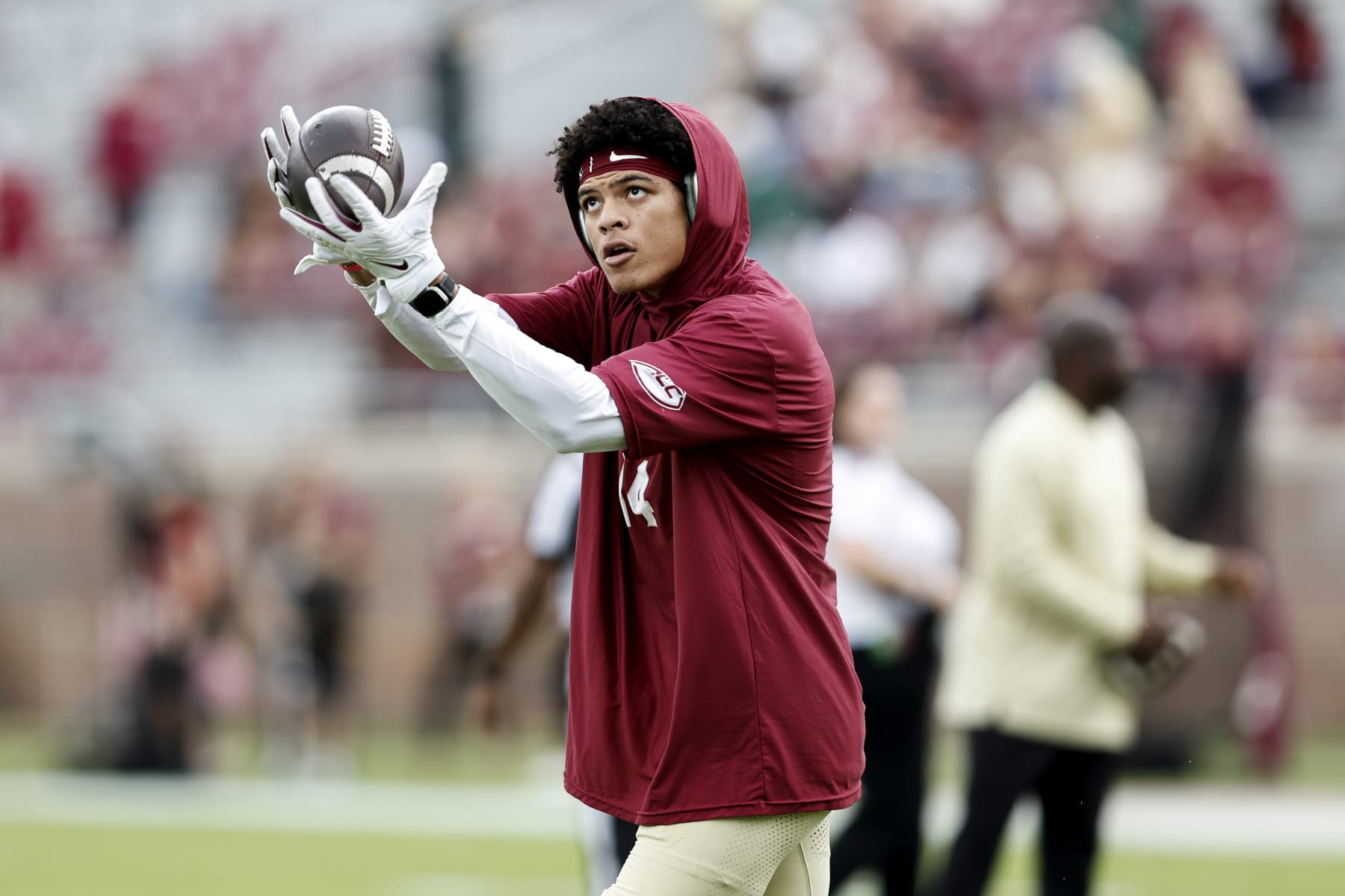 TALLAHASSEE, FL - NOVEMBER 11: Wide Receiver Johnny Wilson #14 of the Florida State Seminoles makes a catch before the game against the Miami Hurricanes at Bobby Bowden Field at Doak S. Campbell Stadium on November 11, 2023 in Tallahassee, Florida. (Photo by Don Juan Moore/Getty Images)