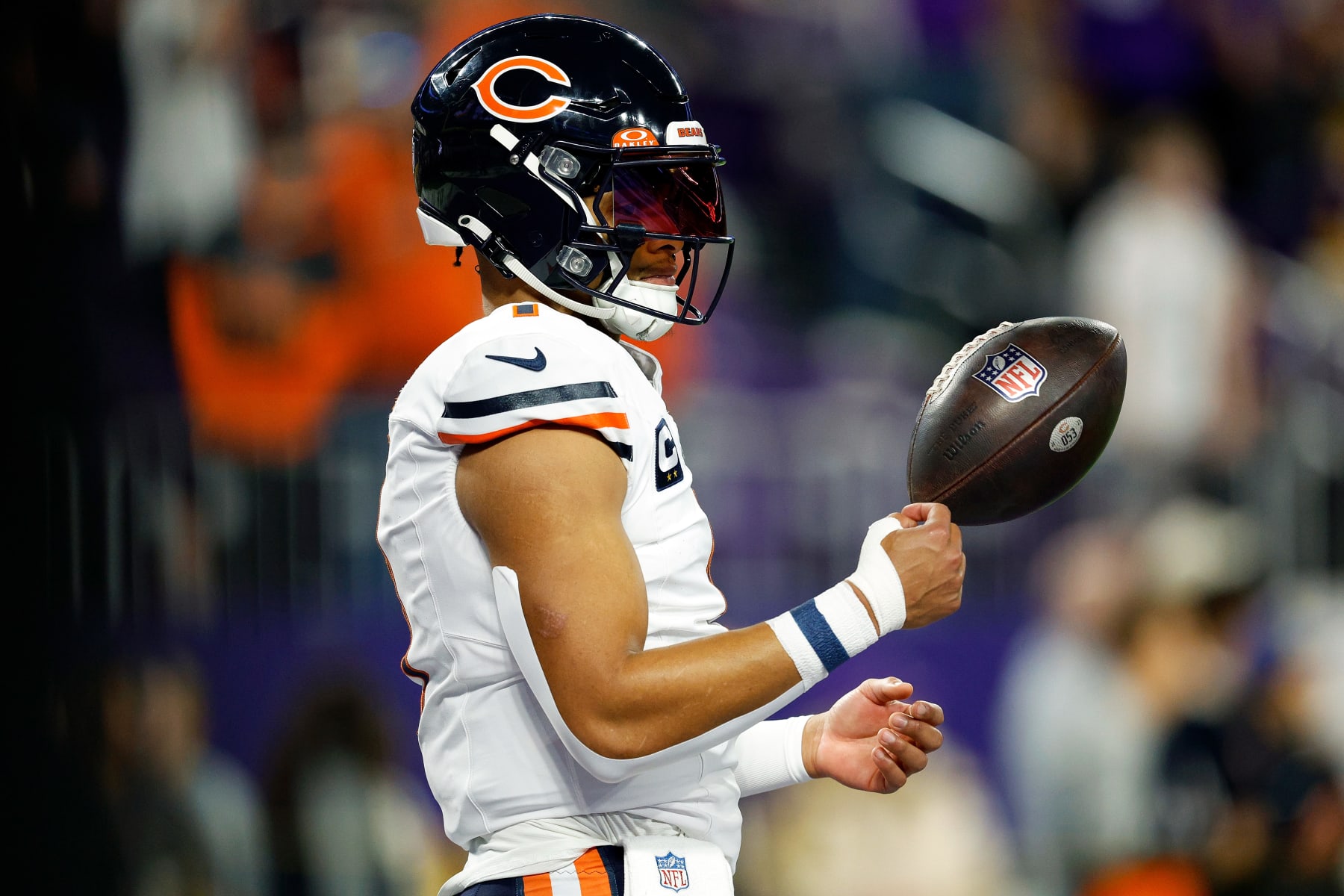 MINNEAPOLIS, MINNESOTA - NOVEMBER 27: Justin Fields #1 of the Chicago Bears looks on prior to the start of the game against the Minnesota Vikings at U.S. Bank Stadium on November 27, 2023 in Minneapolis, Minnesota. The Bears defeated the Vikings 12-10. (Photo by David Berding/Getty Images)