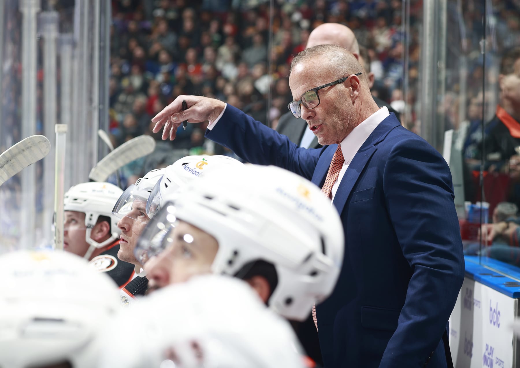 VANCOUVER, CANADA - NOVEMBER 28: Head coach Greg Cronin of the Anaheim Ducks looks on from the bench during their NHL game against the Vancouver Canucks at Rogers Arena on November 28, 2023 in Vancouver, British Columbia, Canada. (Photo by Jeff Vinnick/NHLI via Getty Images)