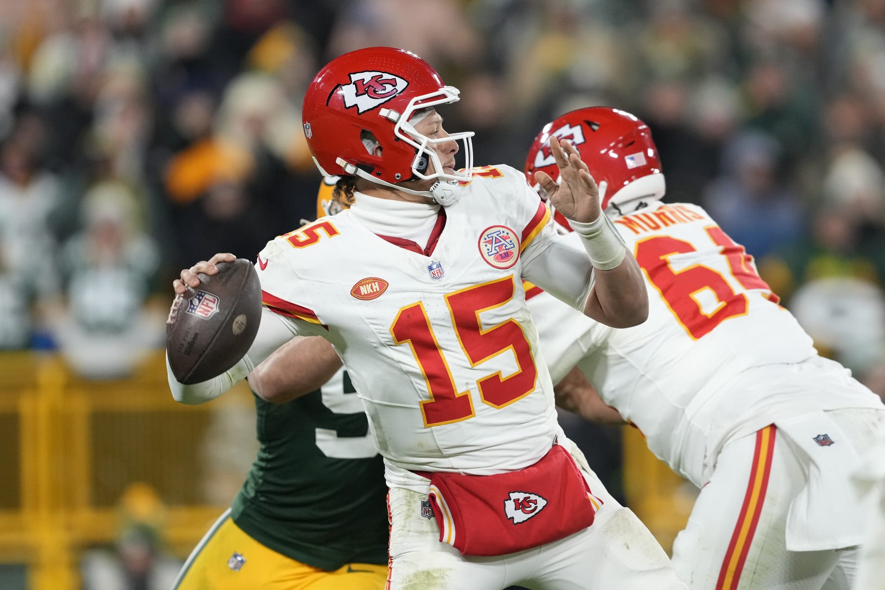 GREEN BAY, WISCONSIN - DECEMBER 03: Patrick Mahomes #15 of the Kansas City Chiefs throws a pass in the second half against the Green Bay Packers at Lambeau Field on December 03, 2023 in Green Bay, Wisconsin. (Photo by Patrick McDermott/Getty Images)