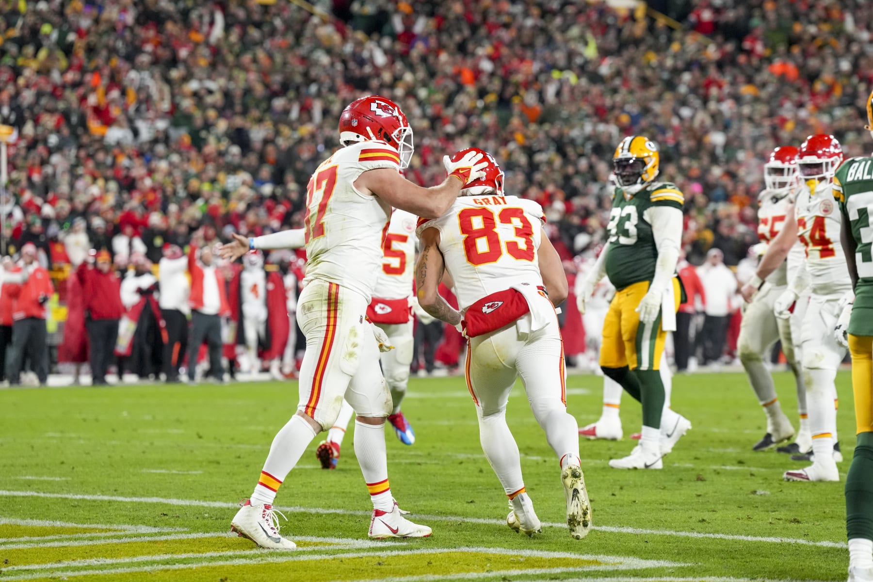 GREEN BAY, WI - DECEMBER 3: Tight end Noah Gray #83 and tight end Travis Kelce #87 of the Kansas City Chiefs celebrate a touch down during an NFL football game against the Green Bay Packers at Lambeau Field on December 3, 2023 in Green Bay, Wisconsin. (Photo by Todd Rosenberg/Getty Images)